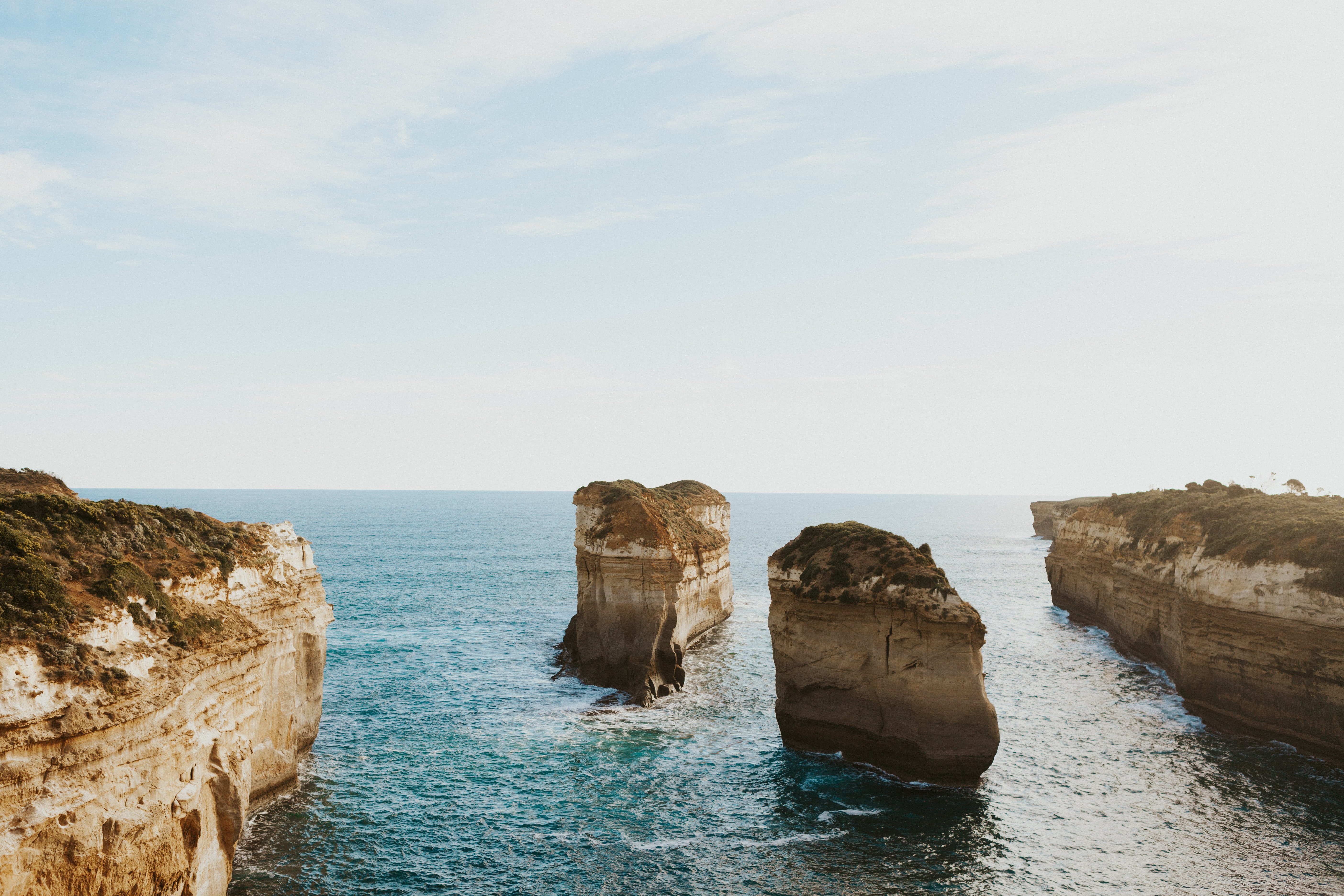 outdoors, horizon over water, scenery, ocean, 12 apostles, body, rock - object, nature, no people, cave, sea, sky, cloud - sky, non-urban scene, mountain, HD Wallpaper