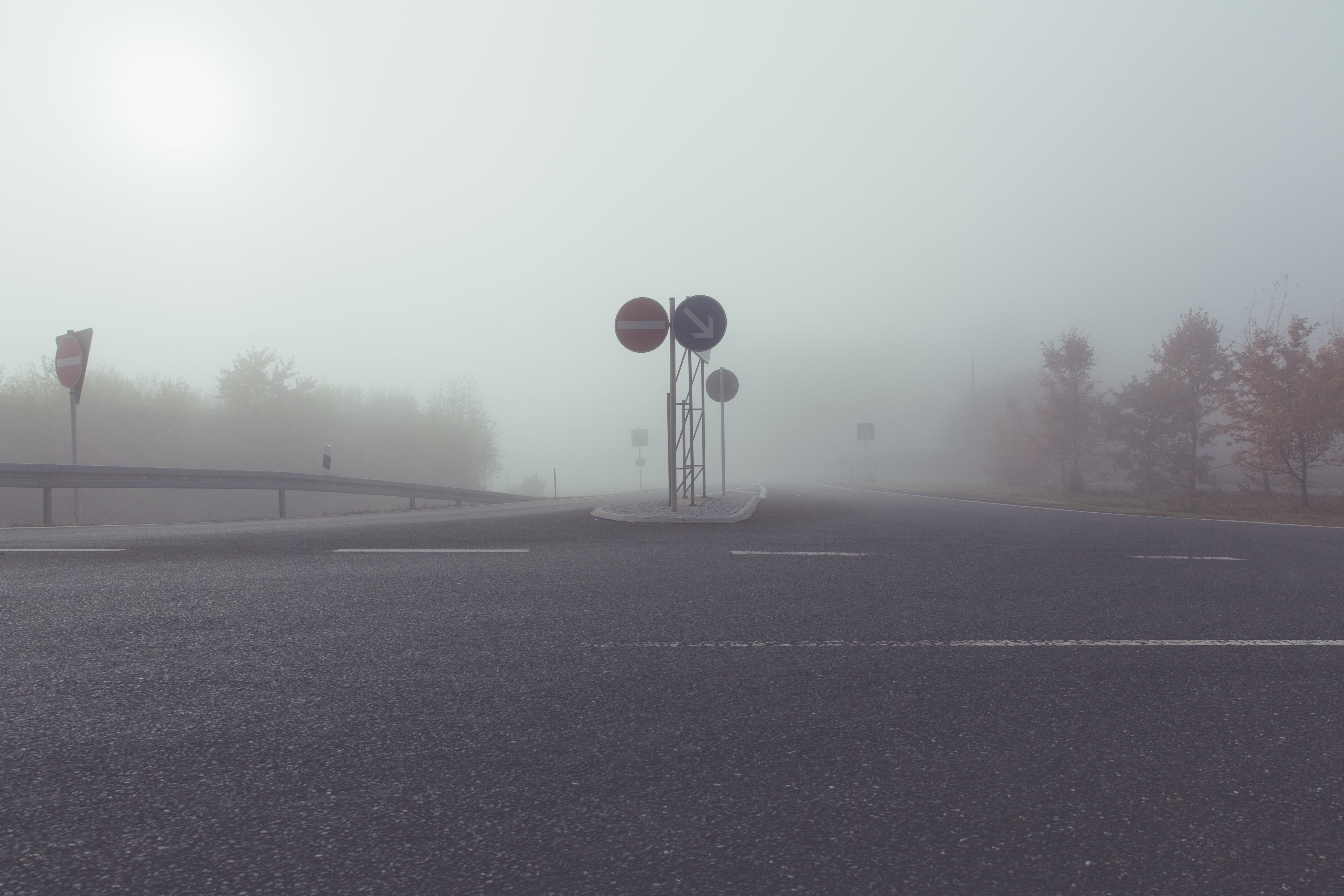 direction, transit, lane, fog, crash barriers, road sign, ground fog, road network, infrastructure, driveway, sign, mobility, distant, automotive, no people, HD Wallpaper