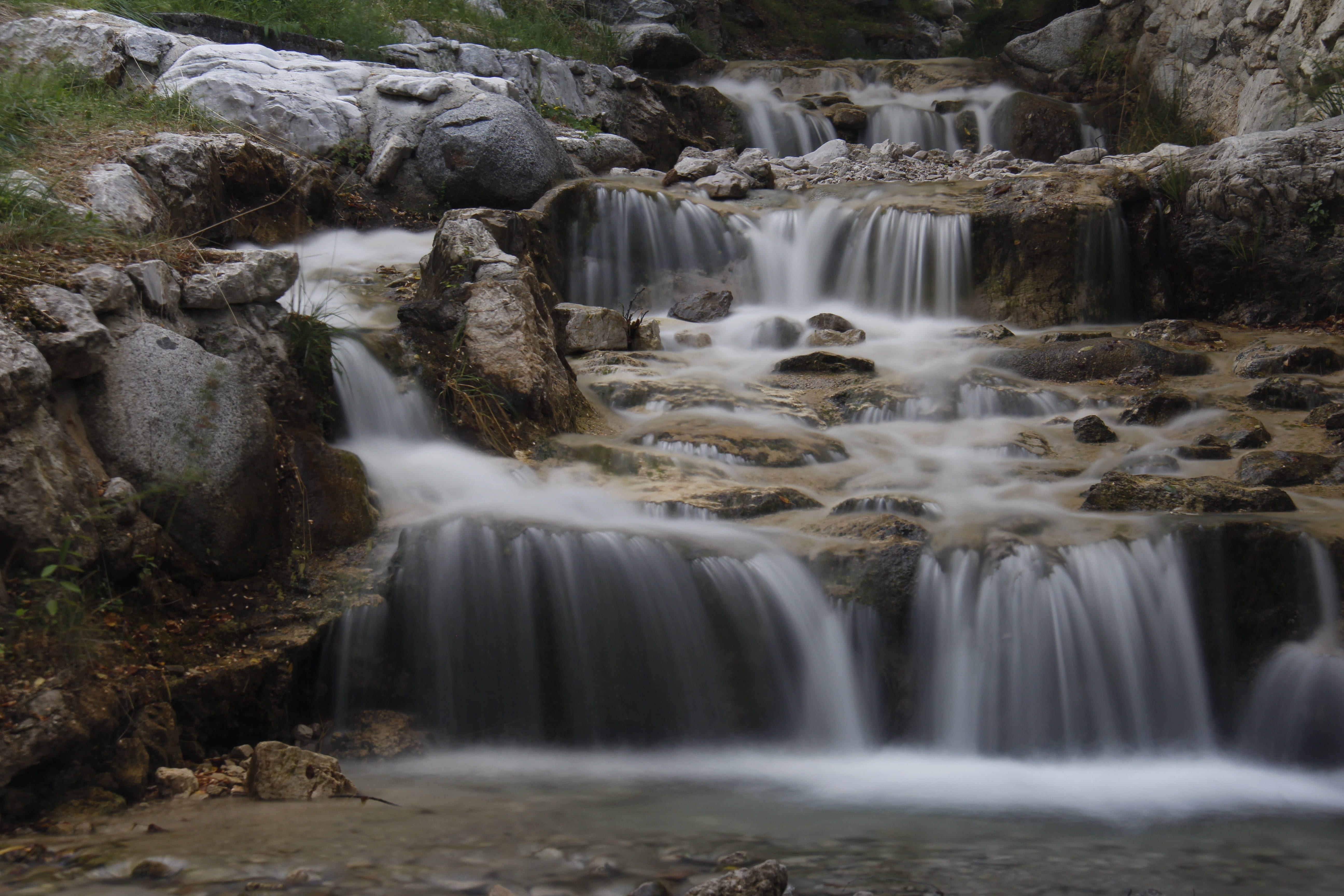 motion, rock, scenics - nature, non-urban scene, environment, long exposure, outdoors, no people, water, lake garda, flowing water, solid, falling water, HD Wallpaper