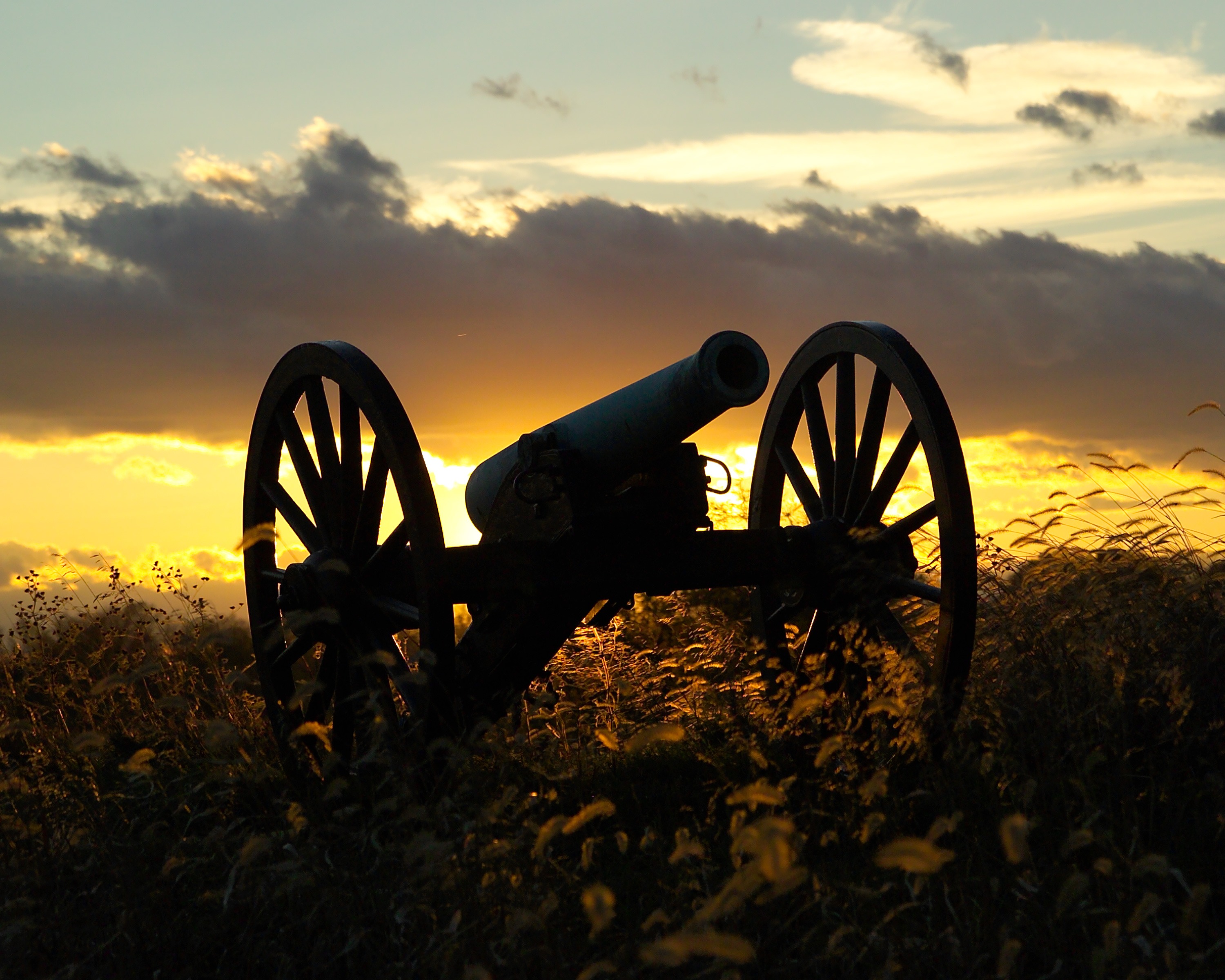 clouds, silhouette, sky, war, maryland, cannon, 2K, beauty in nature, wheel, yellow, sihouette, beautiful, sunset, cloud - sky, history, weapon, no people, HD Wallpaper