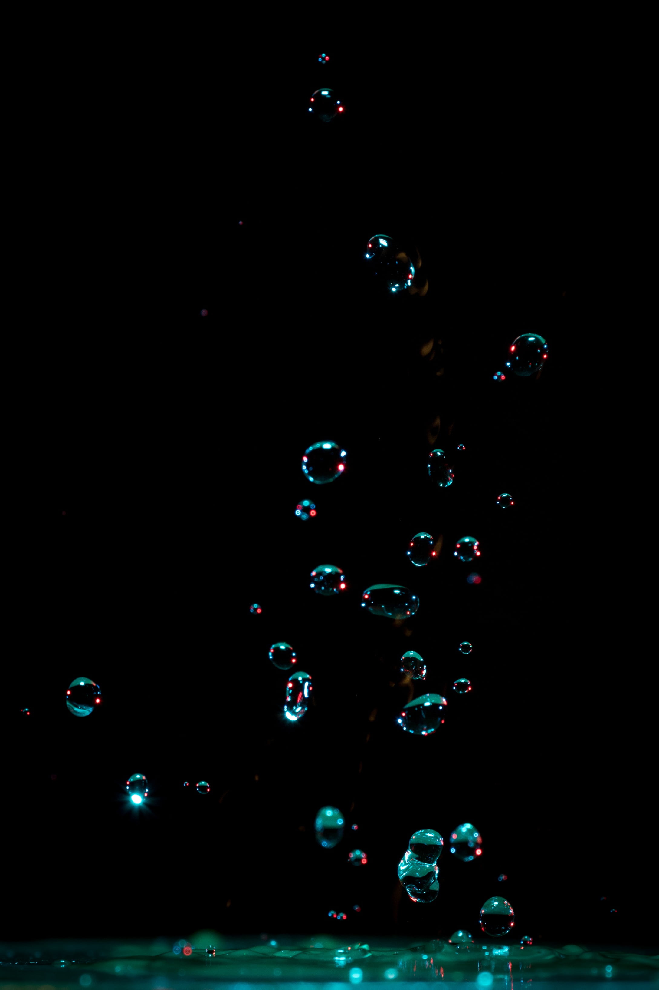 nature, night, purity, 2K, shape, illuminated, day, wet, water, photo, copy space, multi colored, nightlife, black background, drop of water, droplets, Phone HD Wallpaper