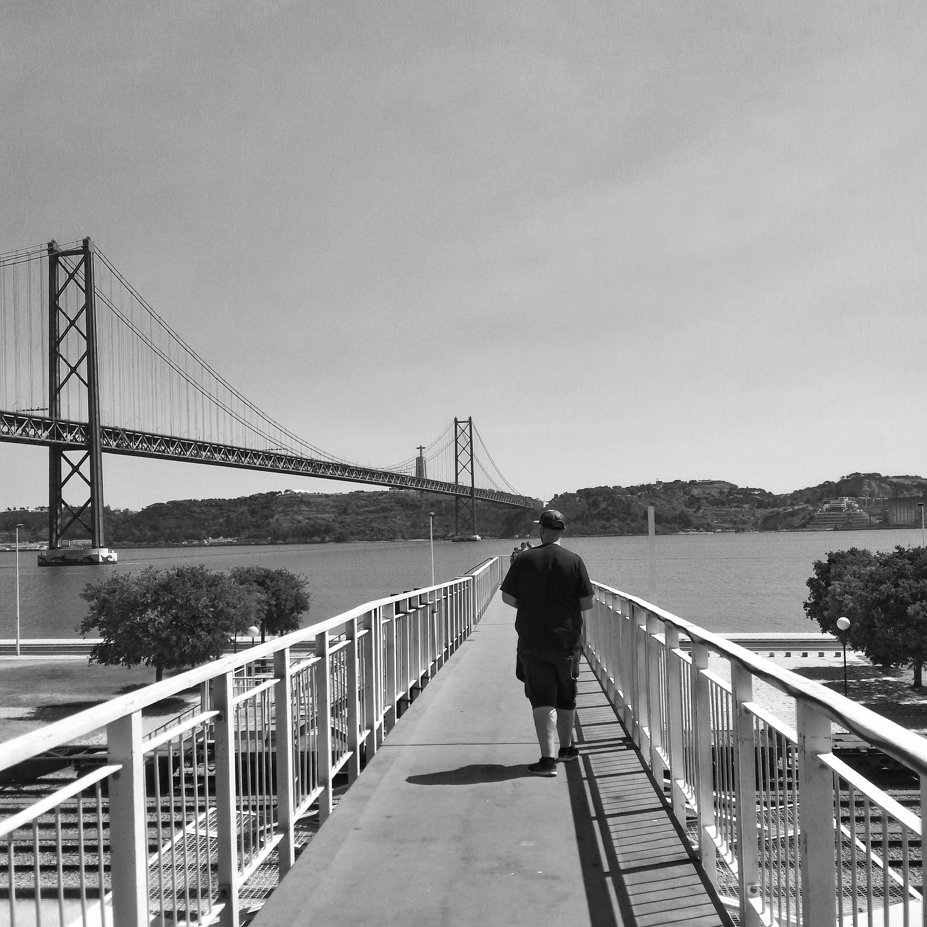 man, ponte 25 de abril, bridge, portrait, railing, engineering, full length, bay, rear view, transportation, built structure, outdoors, portugal, instagram, Phone HD Wallpaper