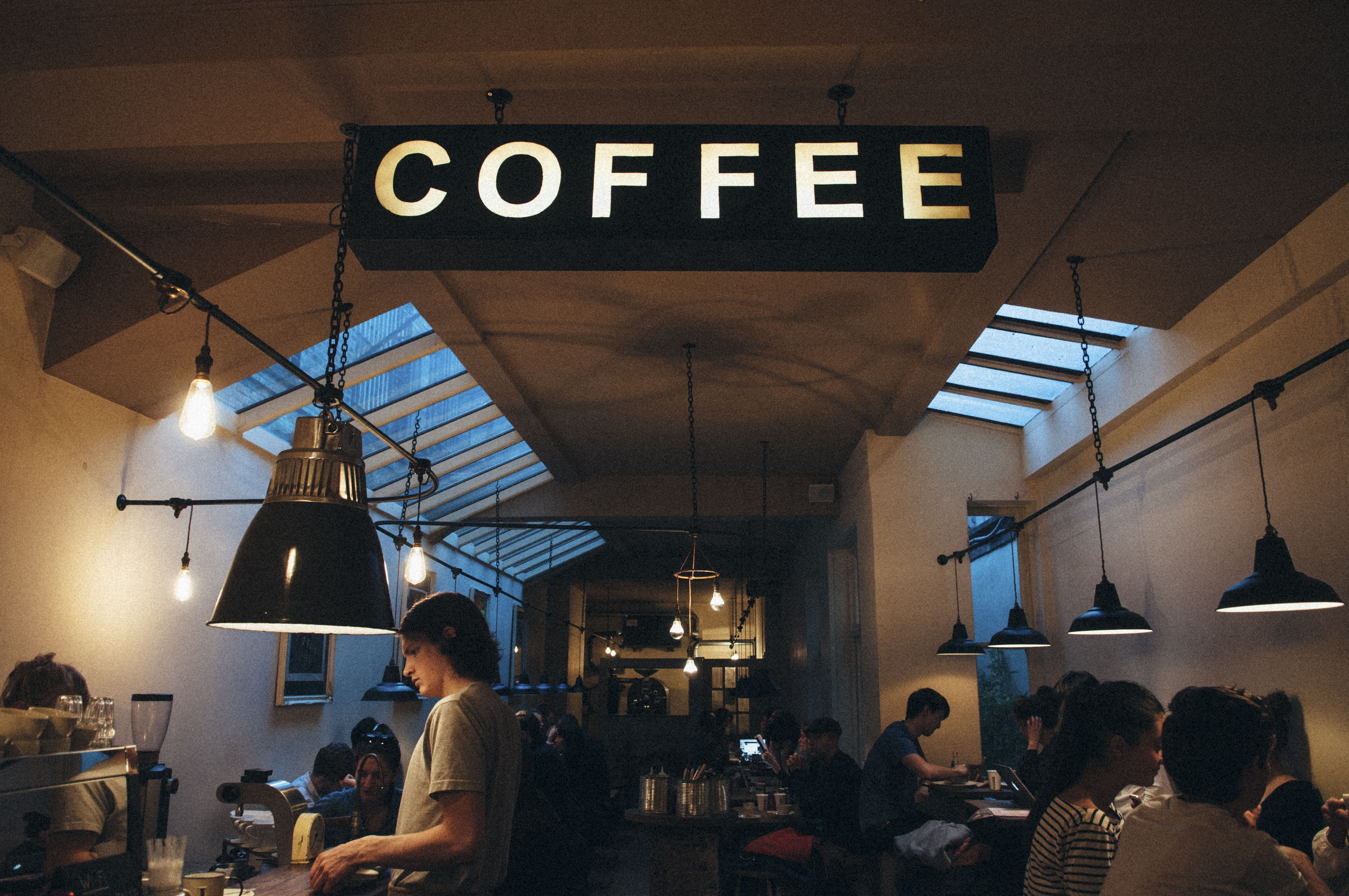text, ceiling, lighting equipment, coffeemaker, adult, people, western script, illuminated, indoors, group of people, crowd, clock, caffeine, architecture, HD Wallpaper