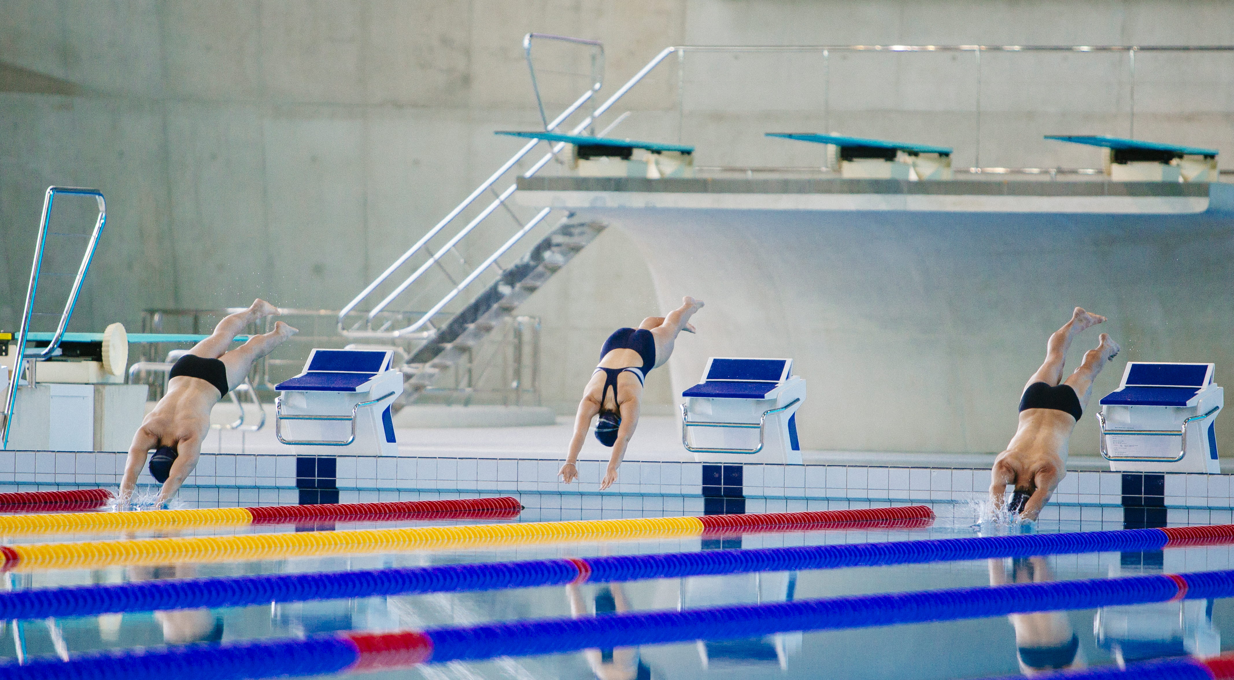 challenge, swimmers, determination, 4K, pool, swimming pool, competition, mid-air, athlete, person, three, indoors, healthy lifestyle, full length, exercising, HD Wallpaper