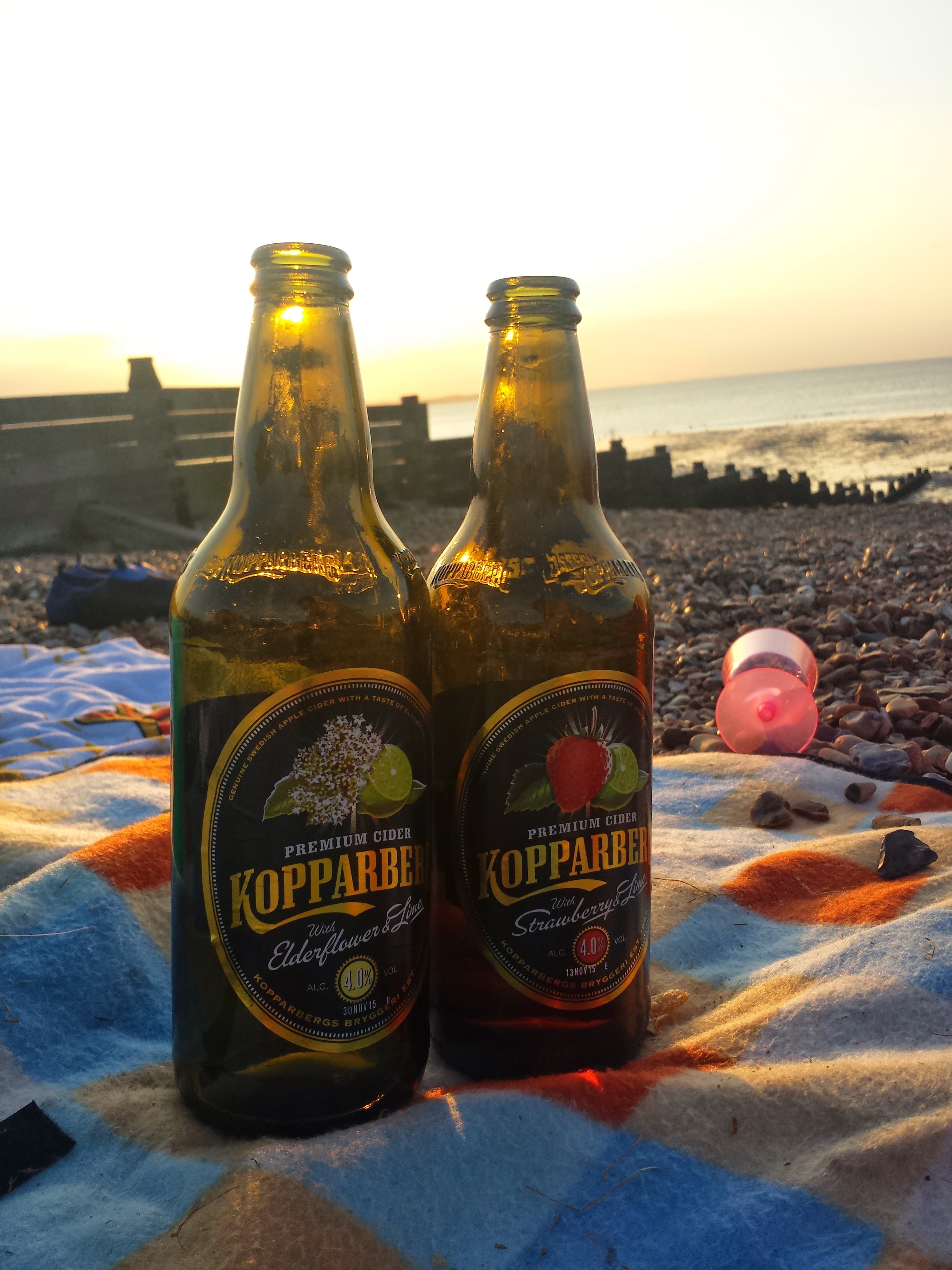 4K, western script, picnic, food and drink, communication, message, horizon, cider, beach, water, drink, land, sunset, beer, close-up, nature, sky, bottle, Phone HD Wallpaper