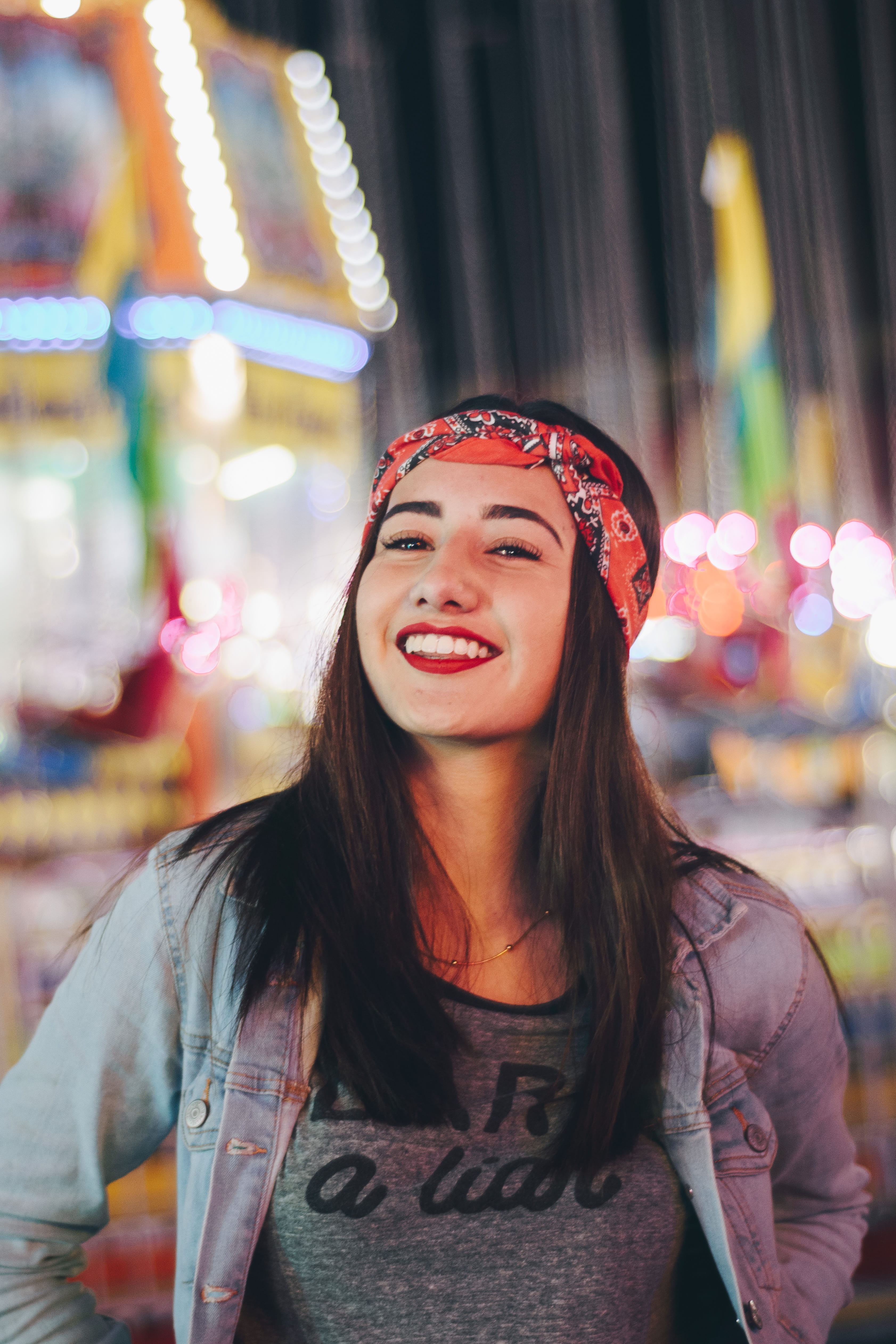 laugh, light, wearing, colour, hapiness, black, real people, bokeh, front view, young adult, hairstyle, focus, girl, looking at camera, teenager, focus on foreground, Phone HD Wallpaper