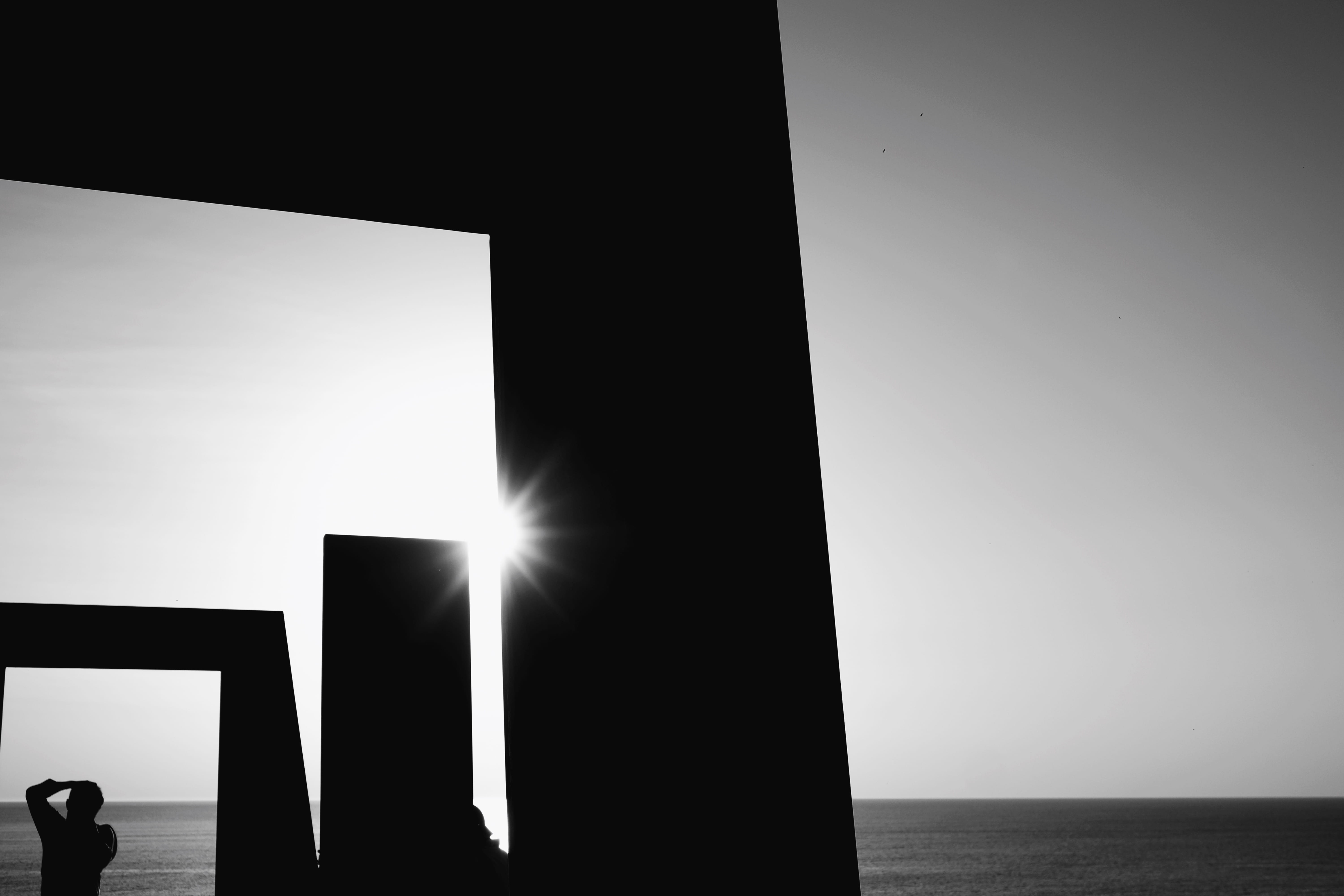 indoors, horizon, adult, art, horizon over water, day, water, 5K, people, square, silhouette, women, sky, sculptures by the sea, sunlight, sculpture, copy space, HD Wallpaper