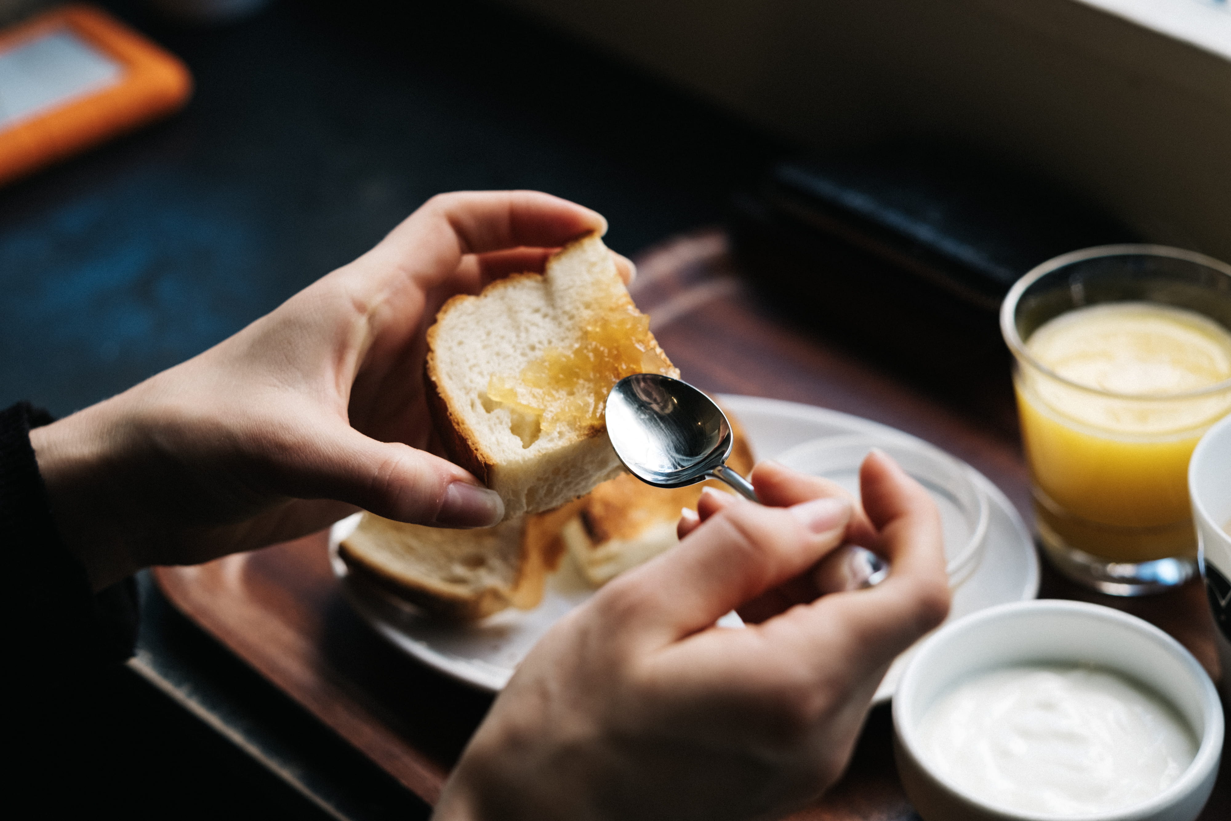 eating, food, toast, bread, indoors, hand, food and drink, meal, freshness, refreshment, spreading, egg, breakfast, dairy product, holding, hygge, human hand, HD Wallpaper