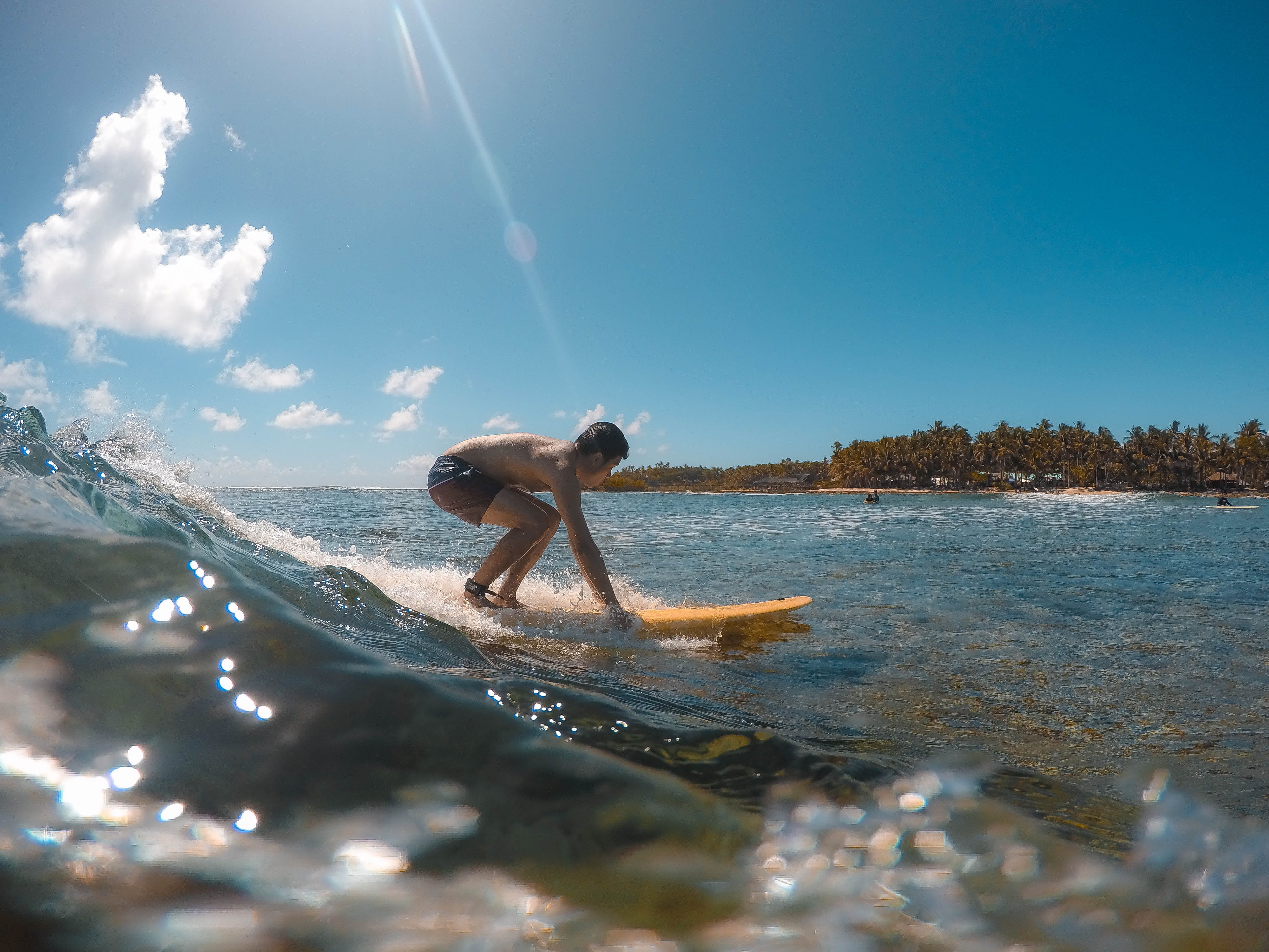 philippines, 4K, leisure activity, shirtless, sea, outdoors, land, beach, motion, tropical, island, full length, canine, beauty in nature, real people, HD Wallpaper