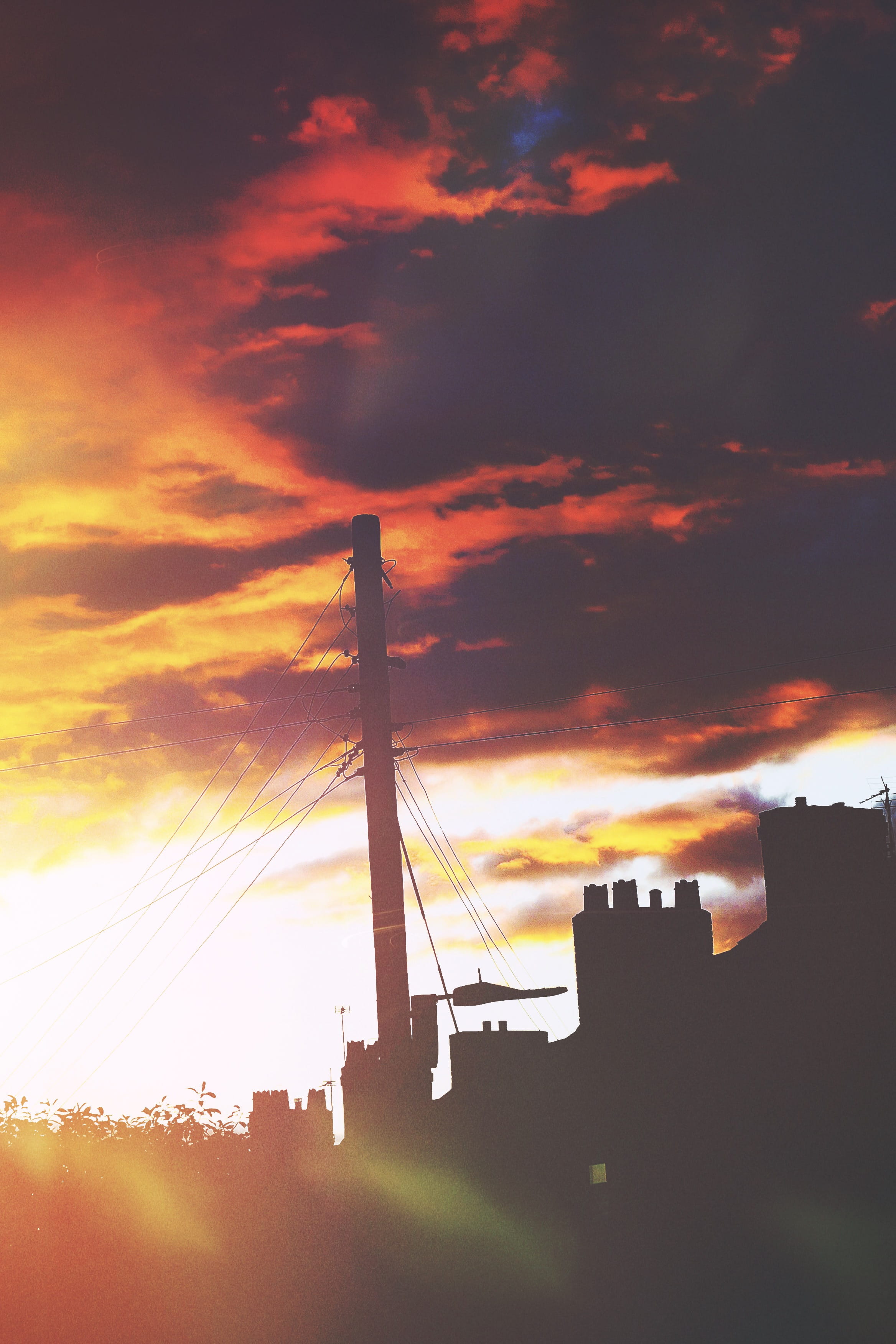 pole, red, chimneys, building exterior, fire sky, wires, vibes, yellow, sky, clouds, architecture, bridge, office building exterior, connection, buildings, Phone HD Wallpaper