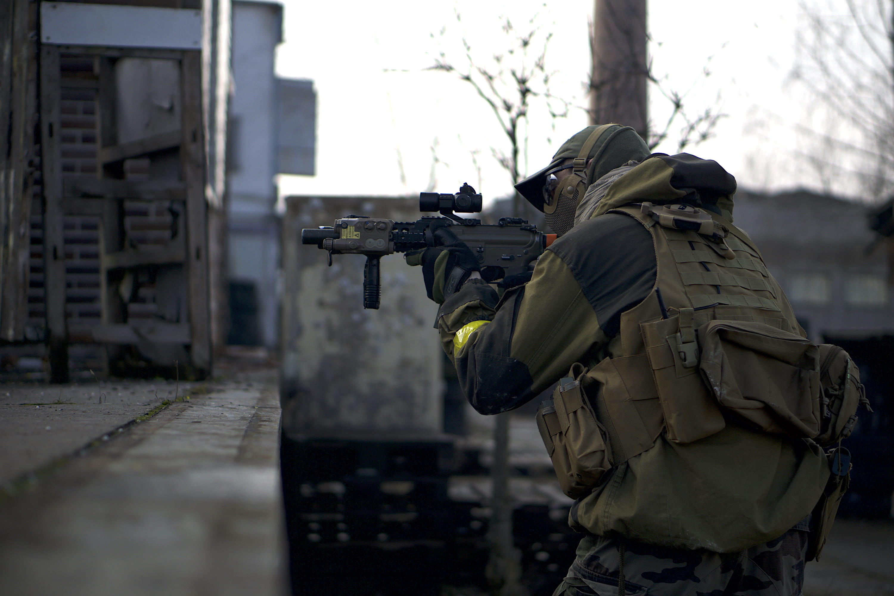standing, building exterior, rear view, near, nature, tree, aifsoft, security, architecture, 2K, gun, uniform, government, soldier, rifle, weapon, person, HD Wallpaper