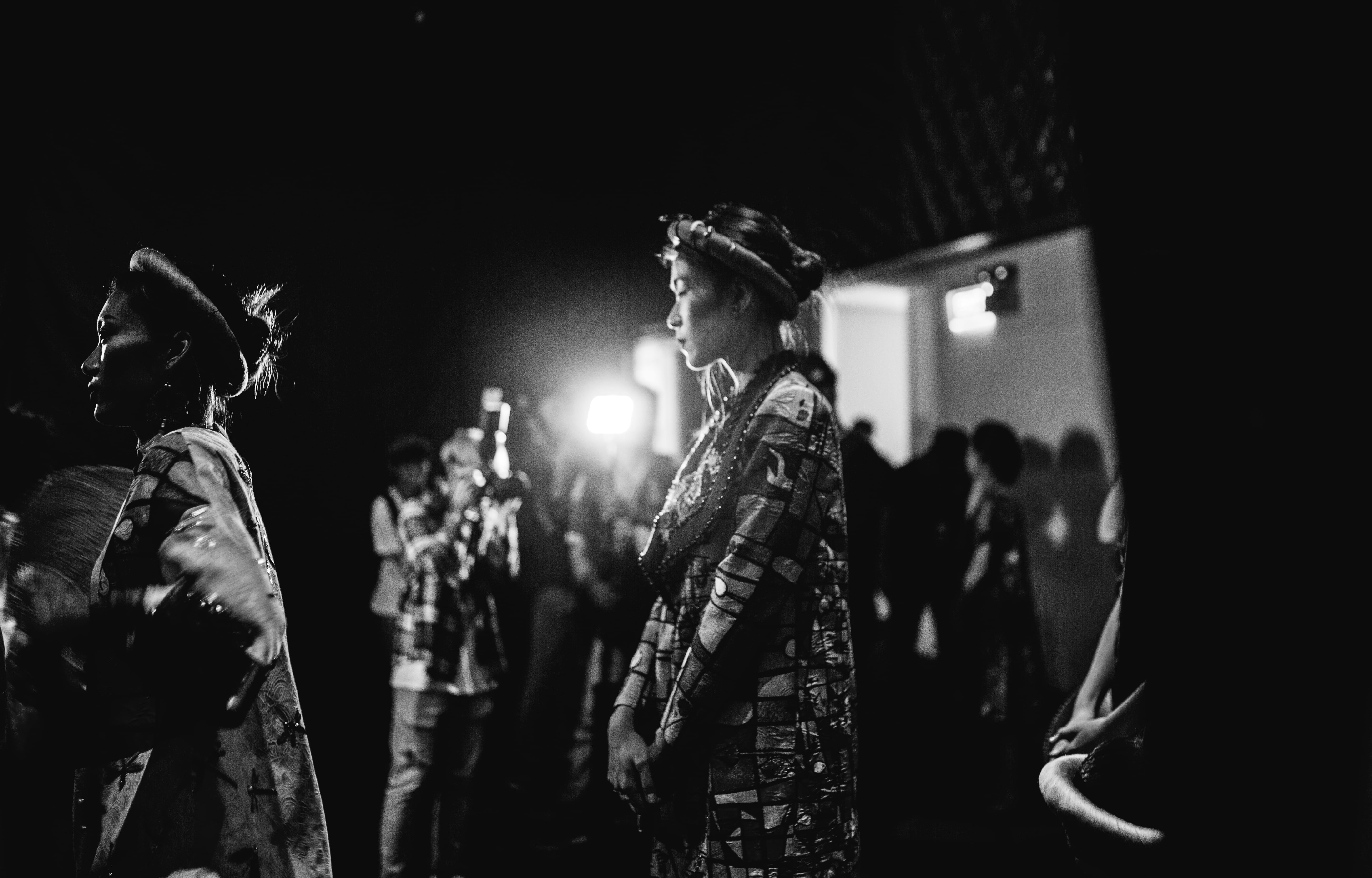 black, group of people, performance, indoors, illuminated, backstage, light, stage - performance space, fashion, lowkey, event, festival, stage, lifestyles, HD Wallpaper