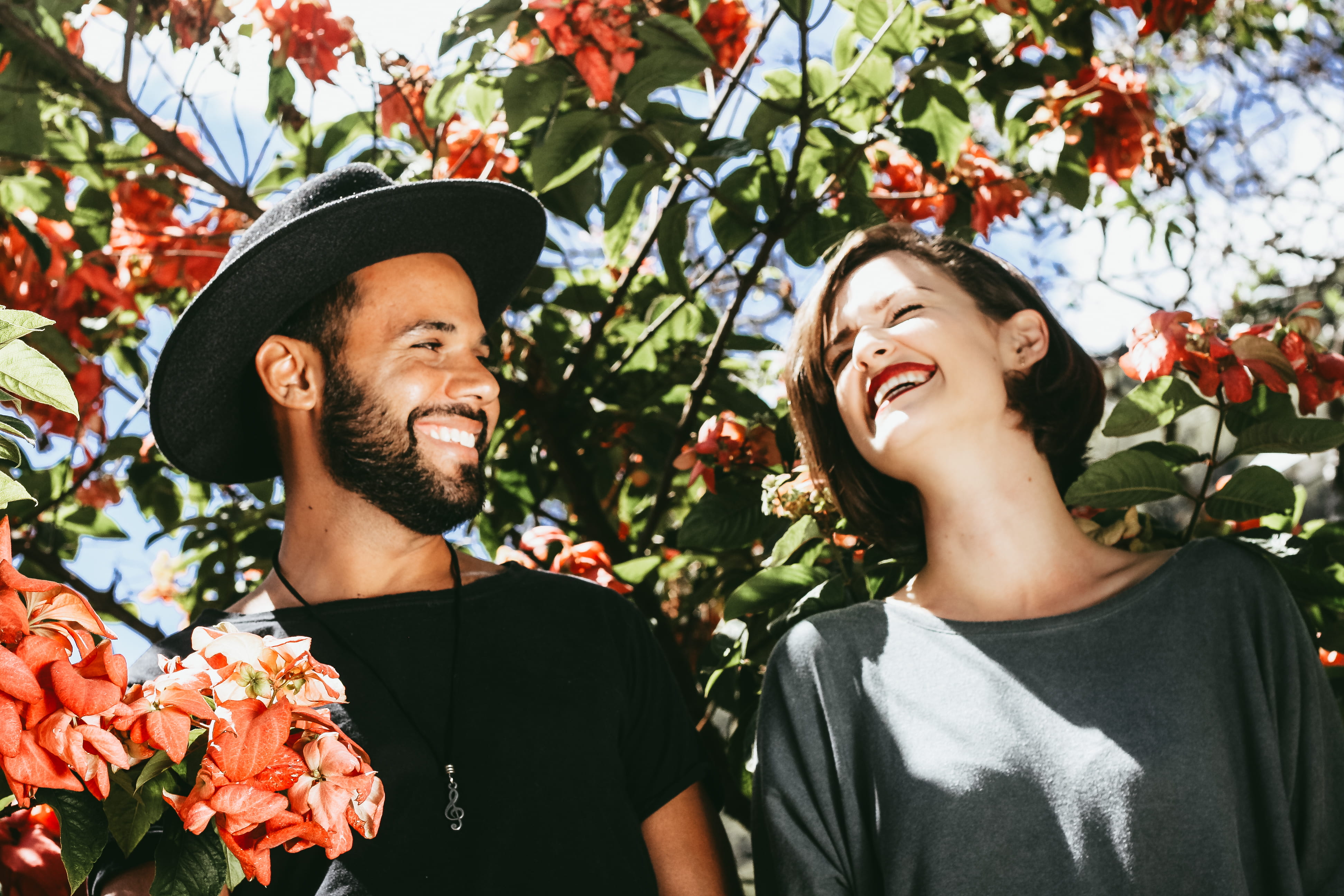 together, love, 4K, daytime, standing, sensitive, friendship, surrounded, floral, trees, men, flower, couple, positive emotion, laughing, person, outdoors, HD Wallpaper