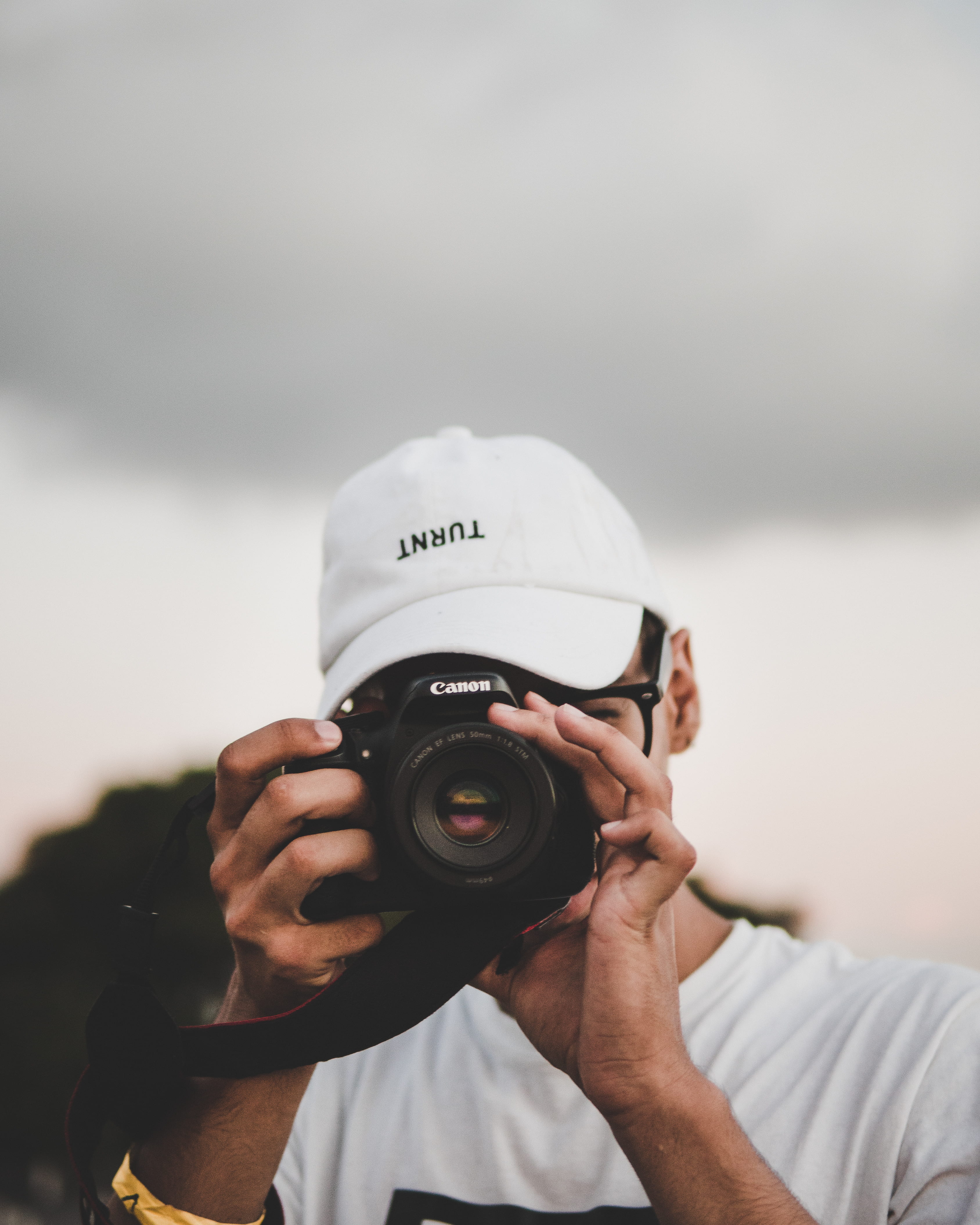 day, slr camera, photographer, hands, picture, obscured face, baseball cap, man, one person, technology, occupation, men, holding, digital single-lens reflex camera, Phone HD Wallpaper