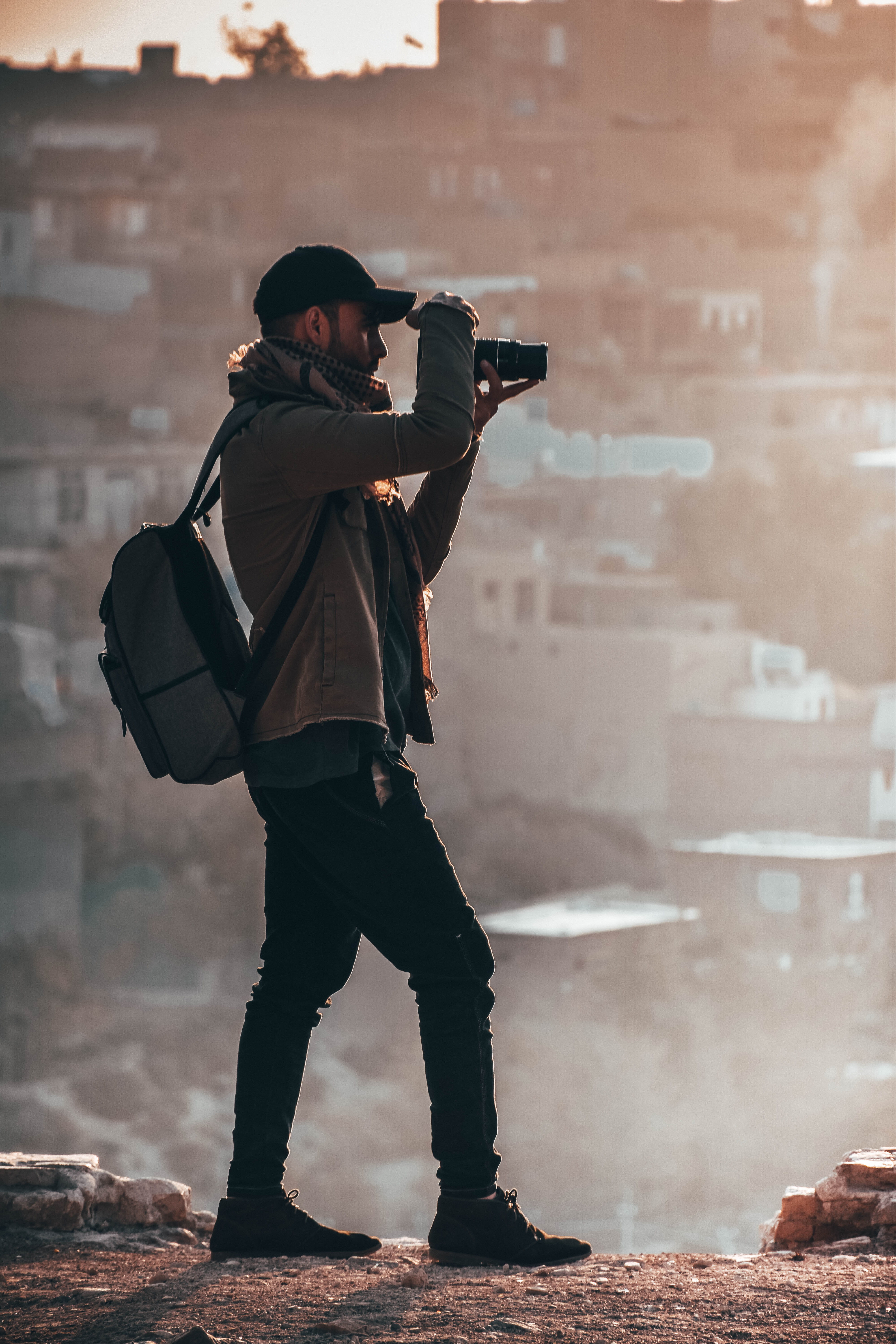 one person, full length, photographic equipment, real people, lifestyles, 5K, taking photo, men, passion, hobby, occupation, camera, holding, portrait, Phone HD Wallpaper
