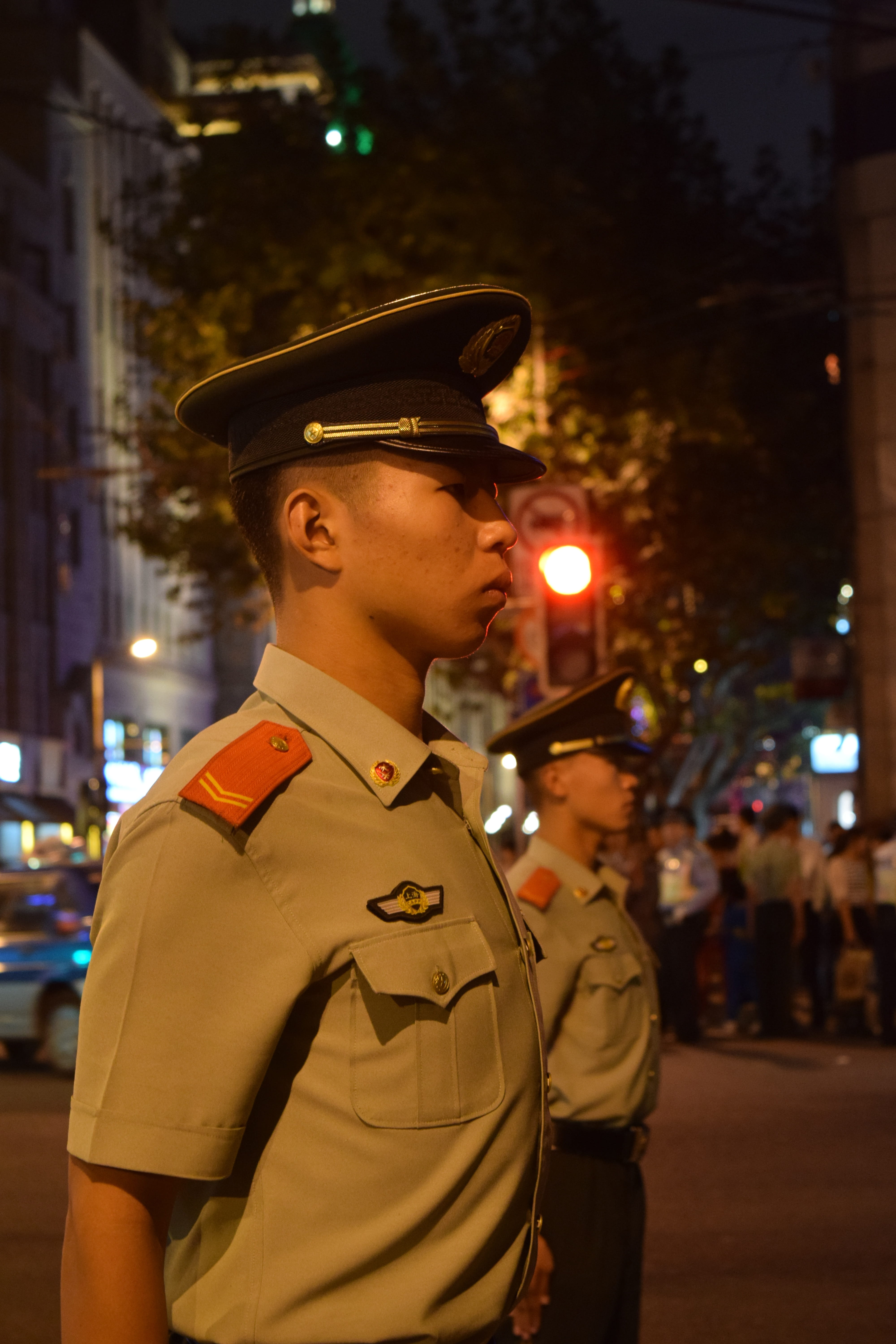 men, looking, illuminated, architecture, strict, law, night, one man only, police force, government, one person, looking away, focus on foreground, uniform, Phone HD Wallpaper