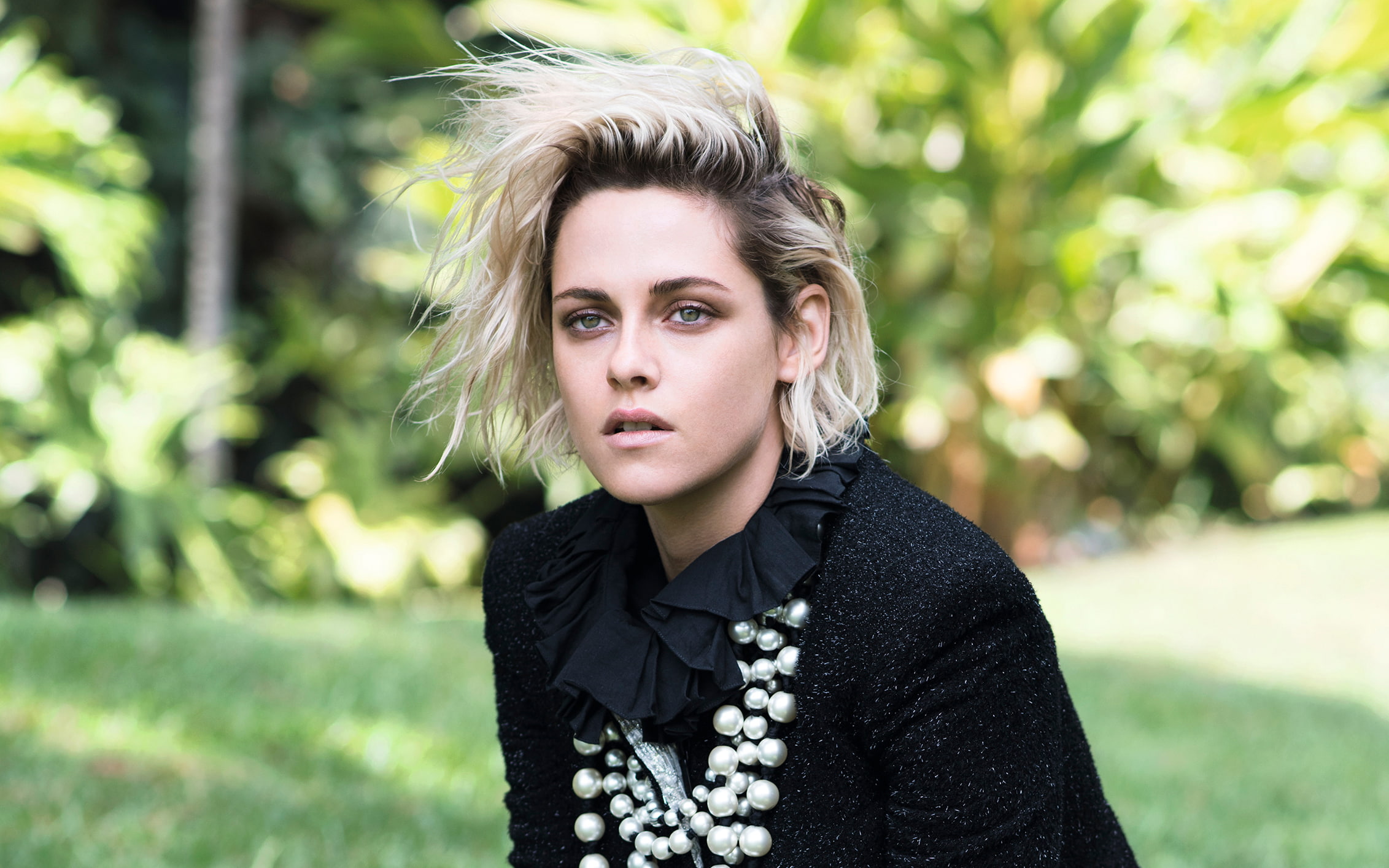 for the magazine, actress, Kristen Stewart, photographer, garden, coat, beads, 1080P, model, blonde, hairstyle, bokeh, greens, in black, the sun, It, makeup, HD Wallpaper