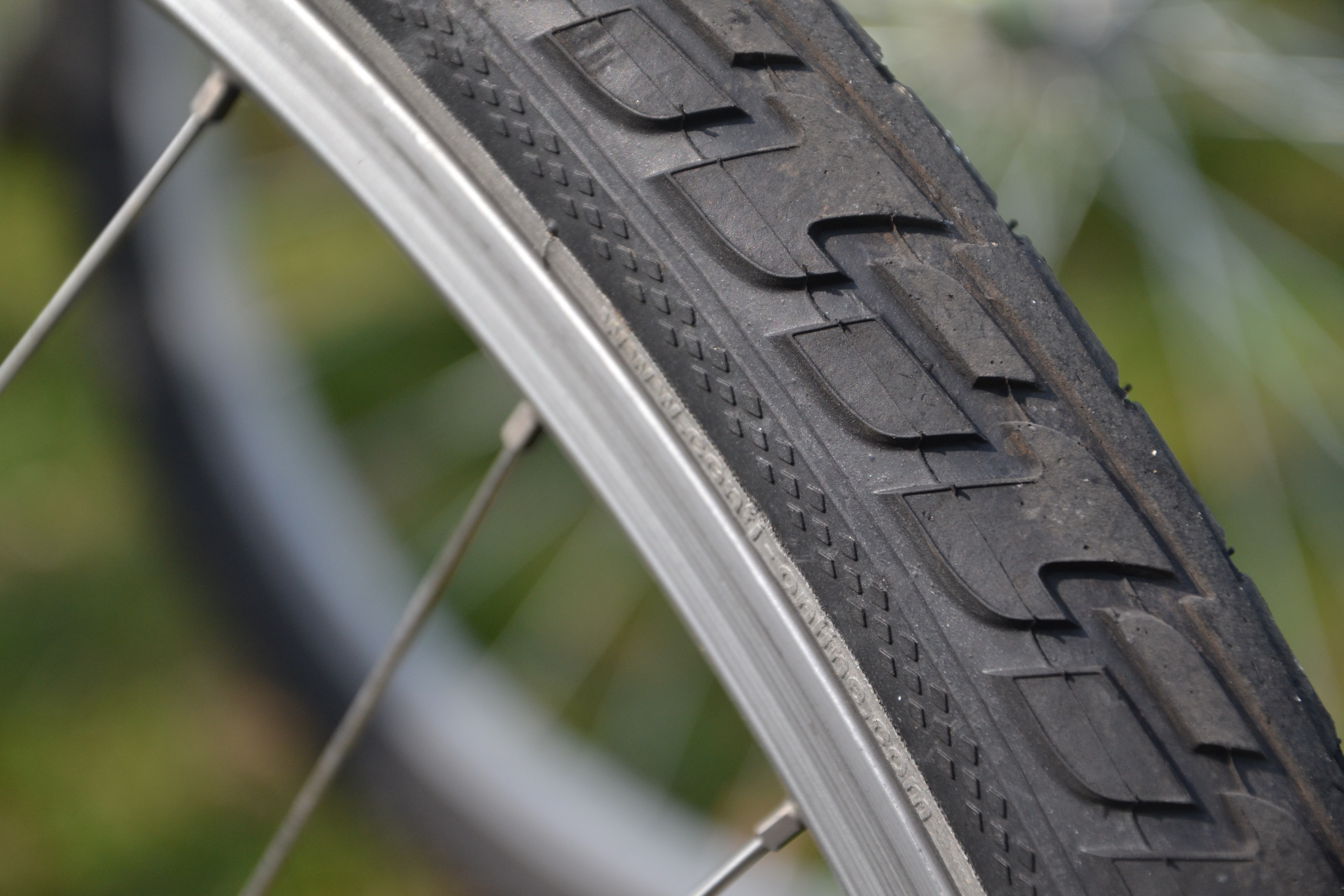 metal, text, tire, safety, number, installation, by bike, wheel, black color, pattern, carving - craft product, no people, inner tubes, sport, selective focus, HD Wallpaper