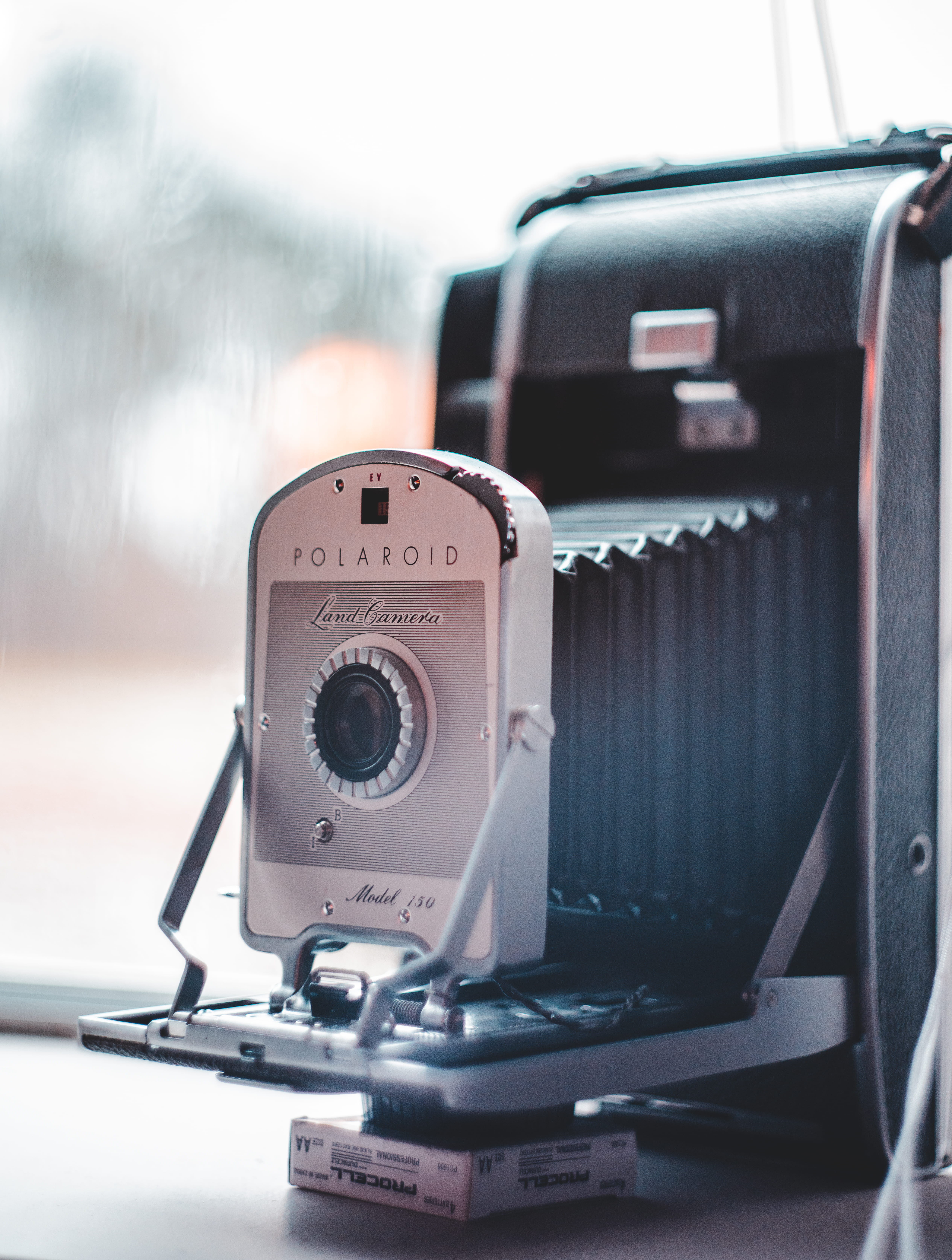 electrical equipment, black, camera, focus on foreground, webcam, day, shutter, blossom, cassette player, indoors, grey, plywood, plant, curtain, video camera, Phone HD Wallpaper