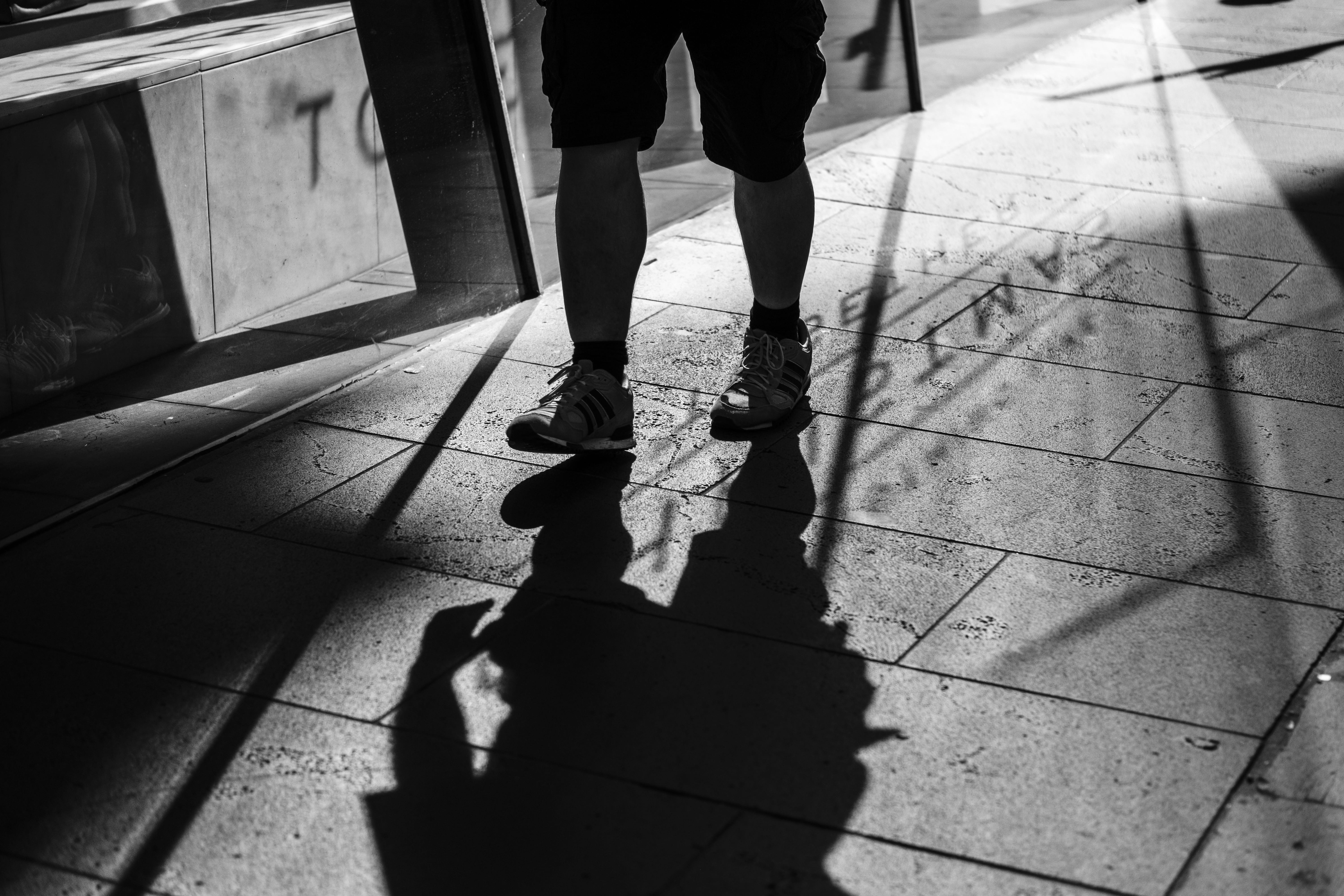focus on shadow, day, shoe, pavement, outdoors, urban, body part, low section, 5K, shadow, footpath, photography, concrete, one person, leisure activity, HD Wallpaper