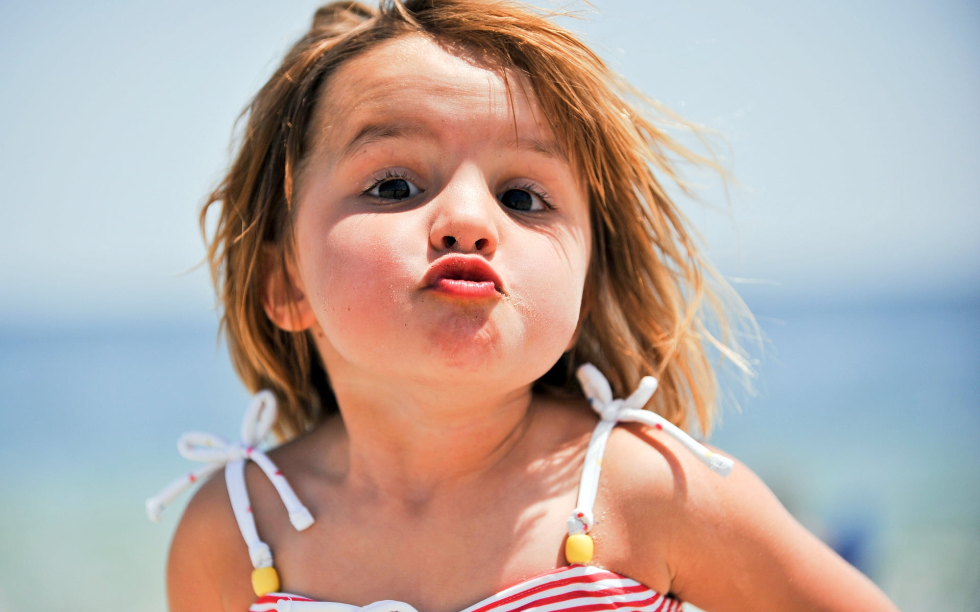 headshot, fun, 1080P, striped, sunlight, cheerful, beach, top, girls, summer, kiss, day, human Face, nature, portrait, looking At Camera, innocence, child, HD Wallpaper