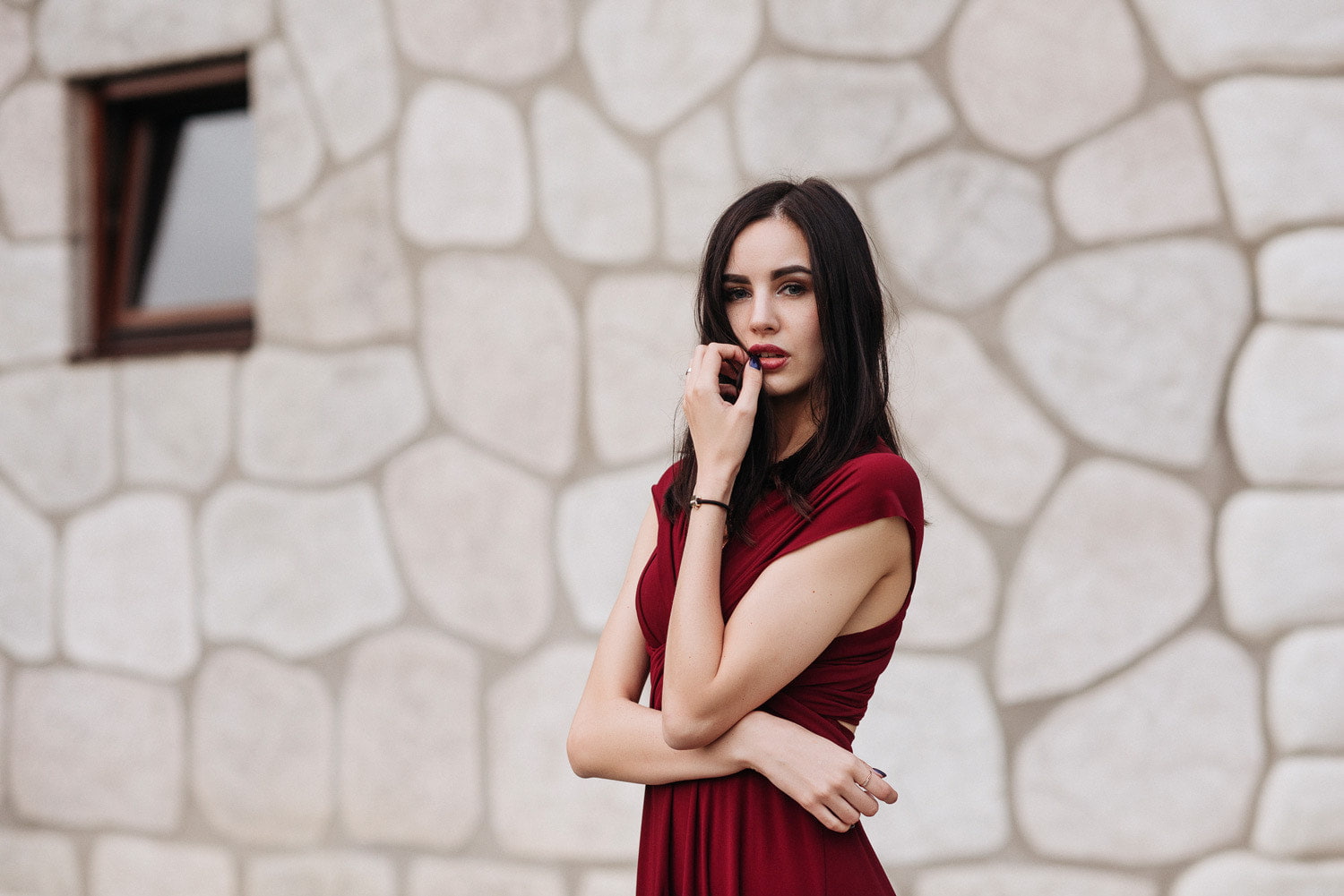 Gene Oryx, brick, clothing, one person, brunette, young women, hairstyle, 720P, dress, standing, beautiful woman, women, black nails, touching face, leisure activity, HD Wallpaper