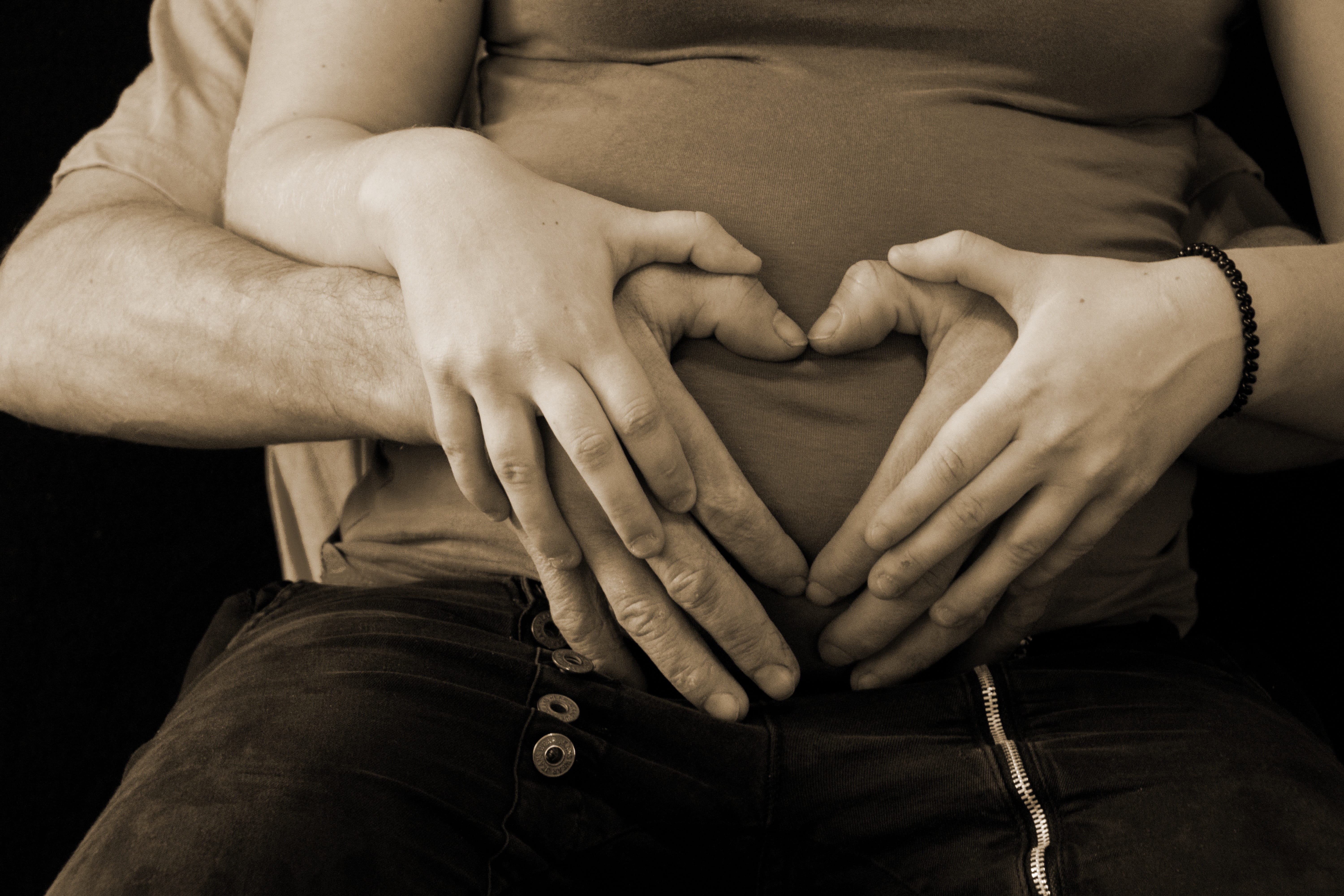 indoors, pregnant, heart, black background, emotion, adult, baby, positive emotion, togetherness, heart shape, close-up, baby belly, midsection, expect, HD Wallpaper
