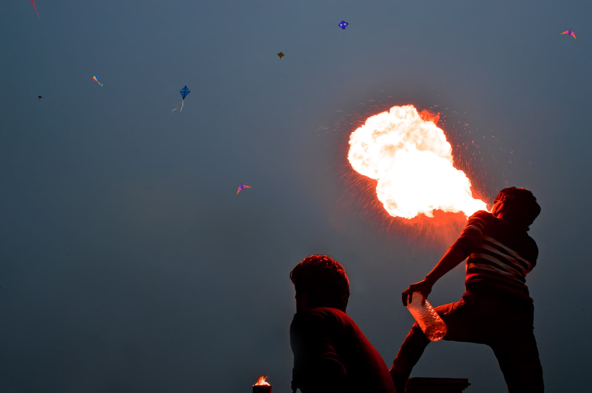 nature, firebolwing, motion, fire, heritage, lifestyles, real people, crazy, men, holding, flame, silhouette, firespinnig, people, blowing, outdoors, man, HD Wallpaper