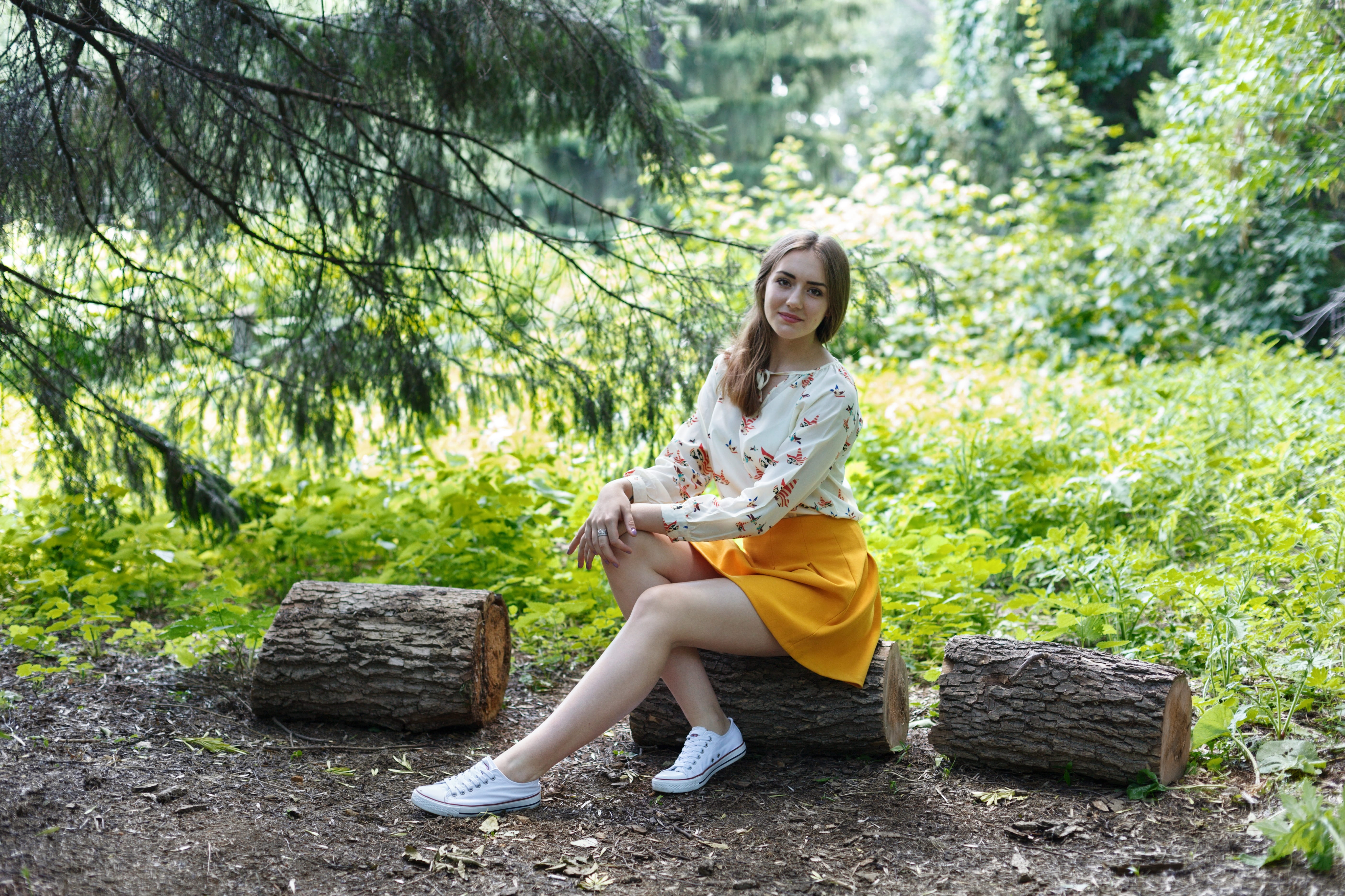 brown hair, russia, hairstyle, green leaves, adult, nature, log, woman, full length, wearing, long, the branch of a tree, shirt, smiling, green, portrait, HD Wallpaper