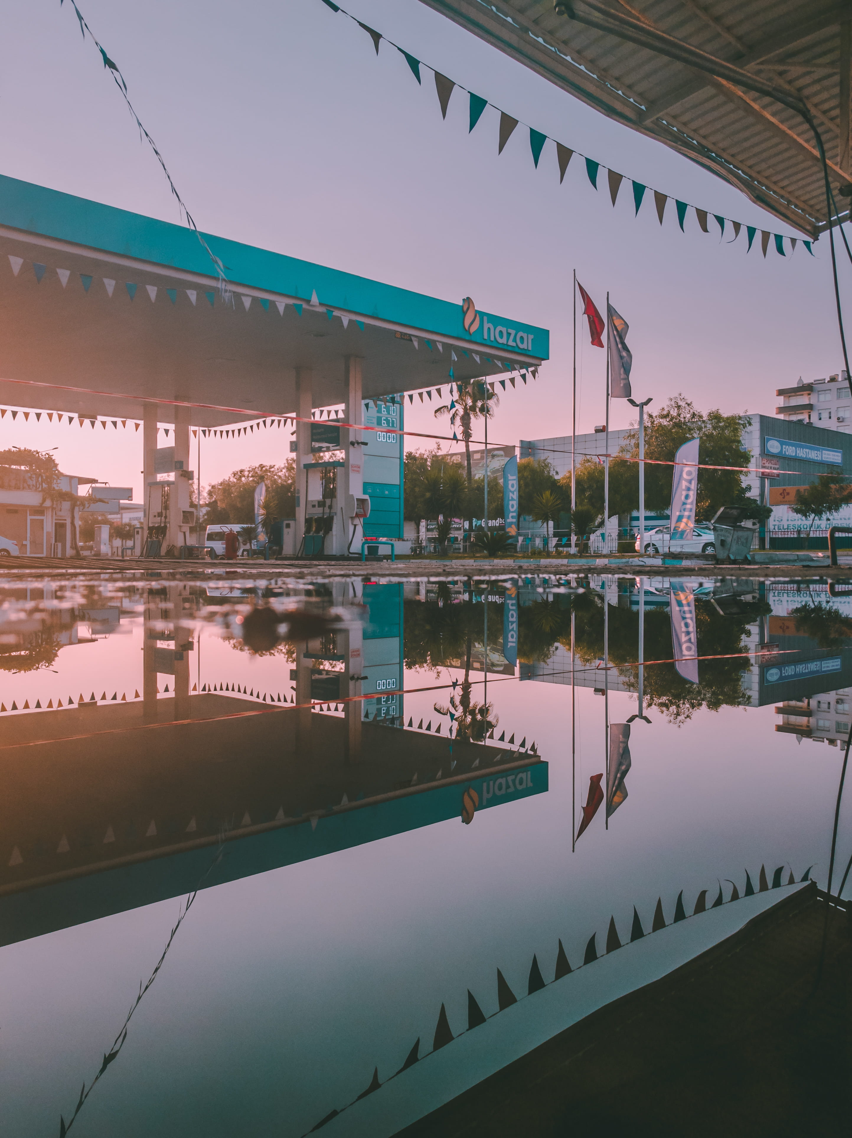 turkey, built structure, sunset, garage, airport terminal, gasoline, dock, no people, gray, sunrise, teal, industrial, reflection, clear sky, forecourt, Phone HD Wallpaper