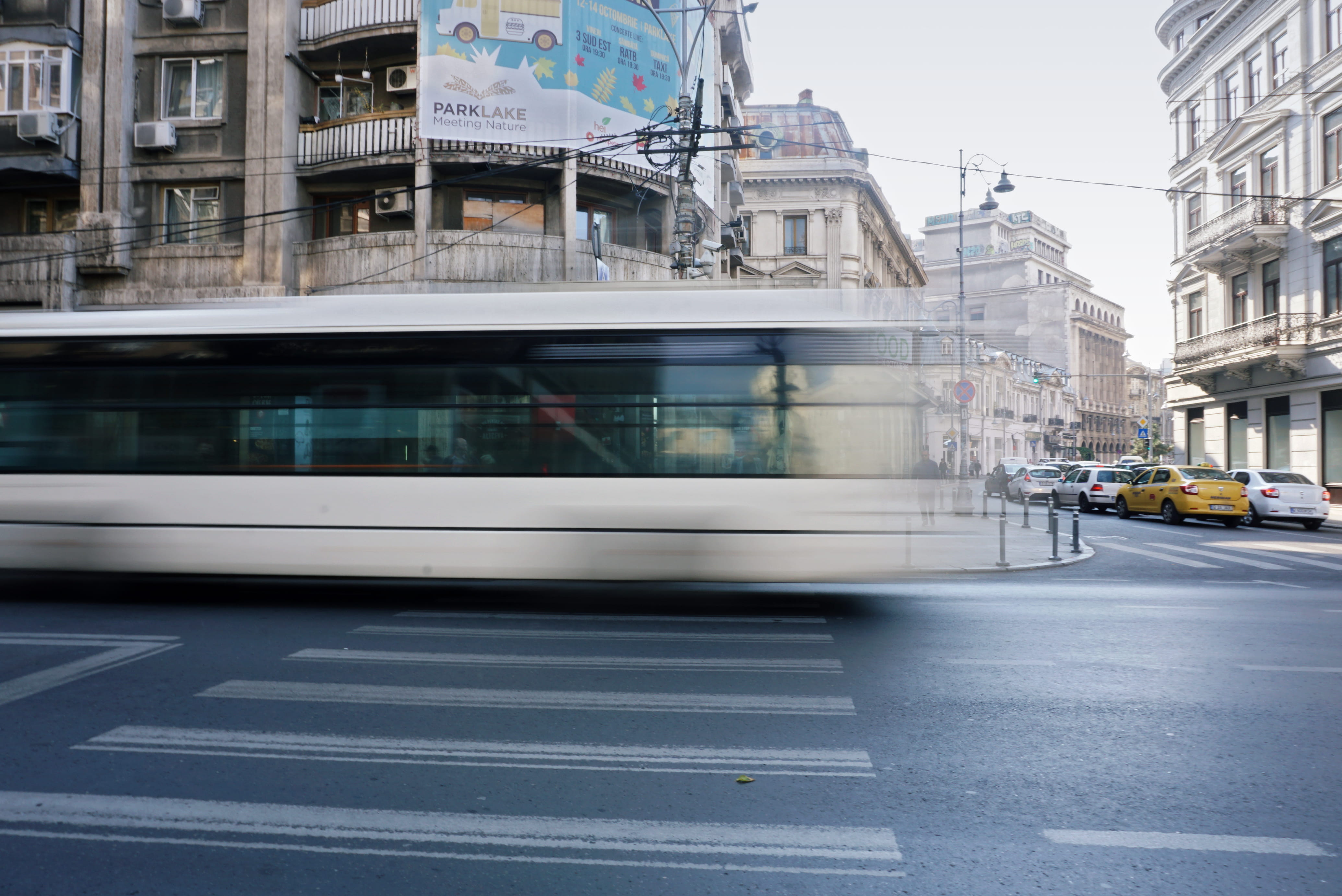 city life, street, building exterior, car, road, machine, running, incidental people, blurred motion, zebra crossing, vehicle, building, land vehicle, train, HD Wallpaper