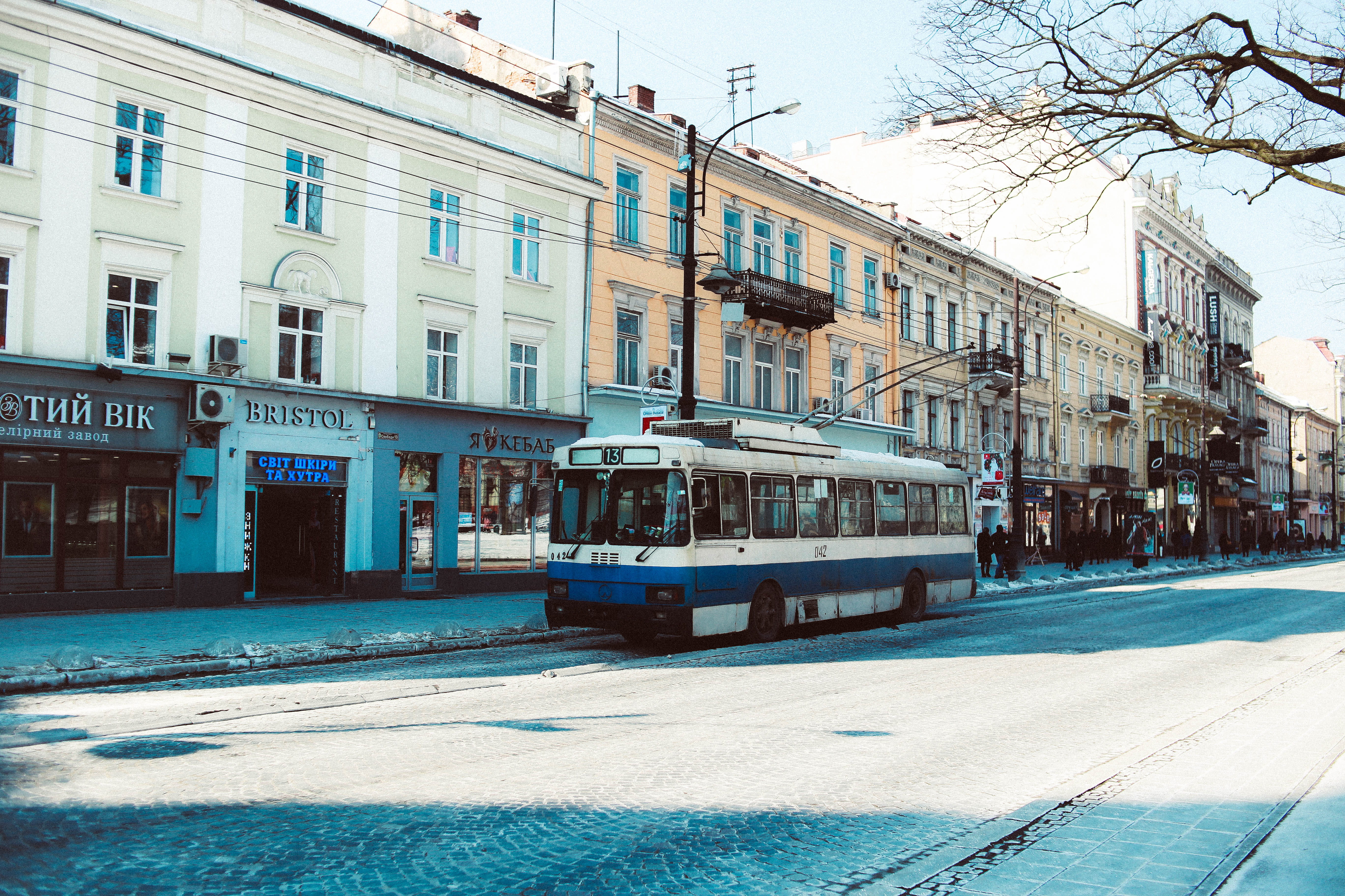 city, white, sunlight, cable car, daytime, nature, outdoors, cold, blue, road, day, transportation, urban, tram, track, building exterior, snow, concrete, HD Wallpaper