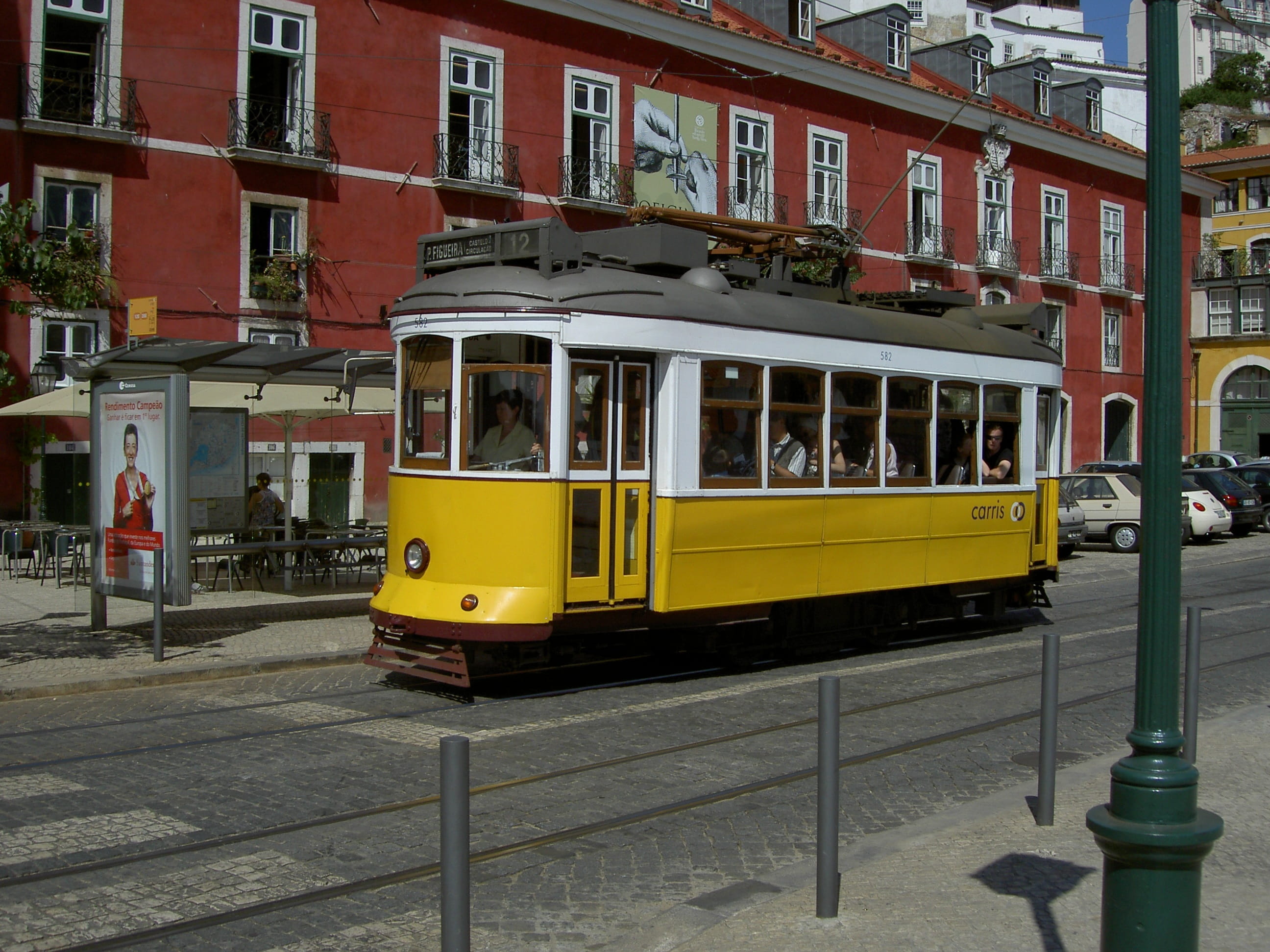 street, day, Lisbon, incidental people, cable car, Portugal, track, building exterior, mode of transportation, school bus, mode of transport, city life, HD Wallpaper