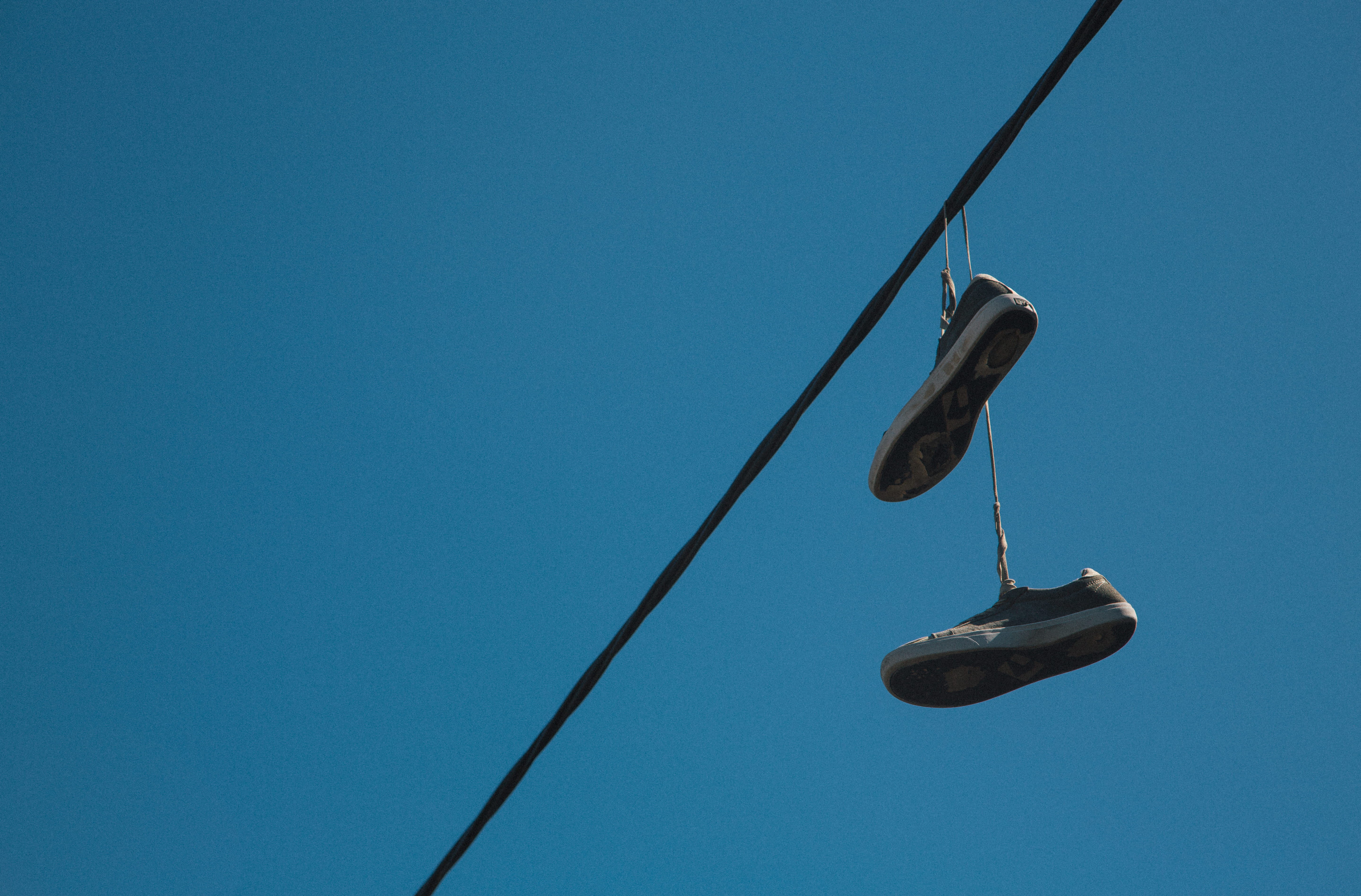 powerline, day, toowoomba, power supply, rope, shoes, powerlines, copy space, low angle view, pair, urban, electricity, blue, australia, blue background, HD Wallpaper