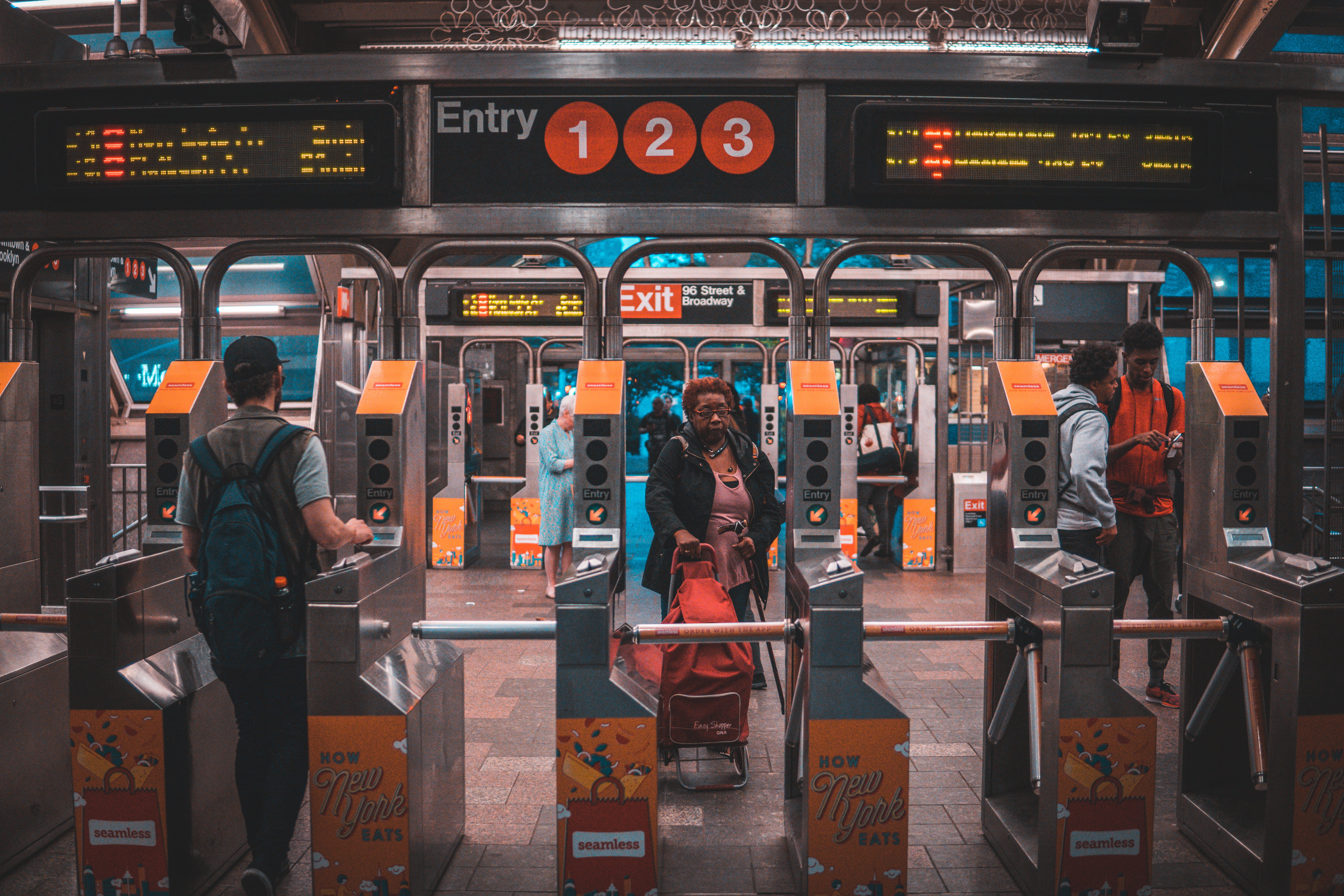 western script, mode of transportation, text, red, woman, 5K, city, station, railroad station, real people, city life, men, standing, architecture, pulling, HD Wallpaper