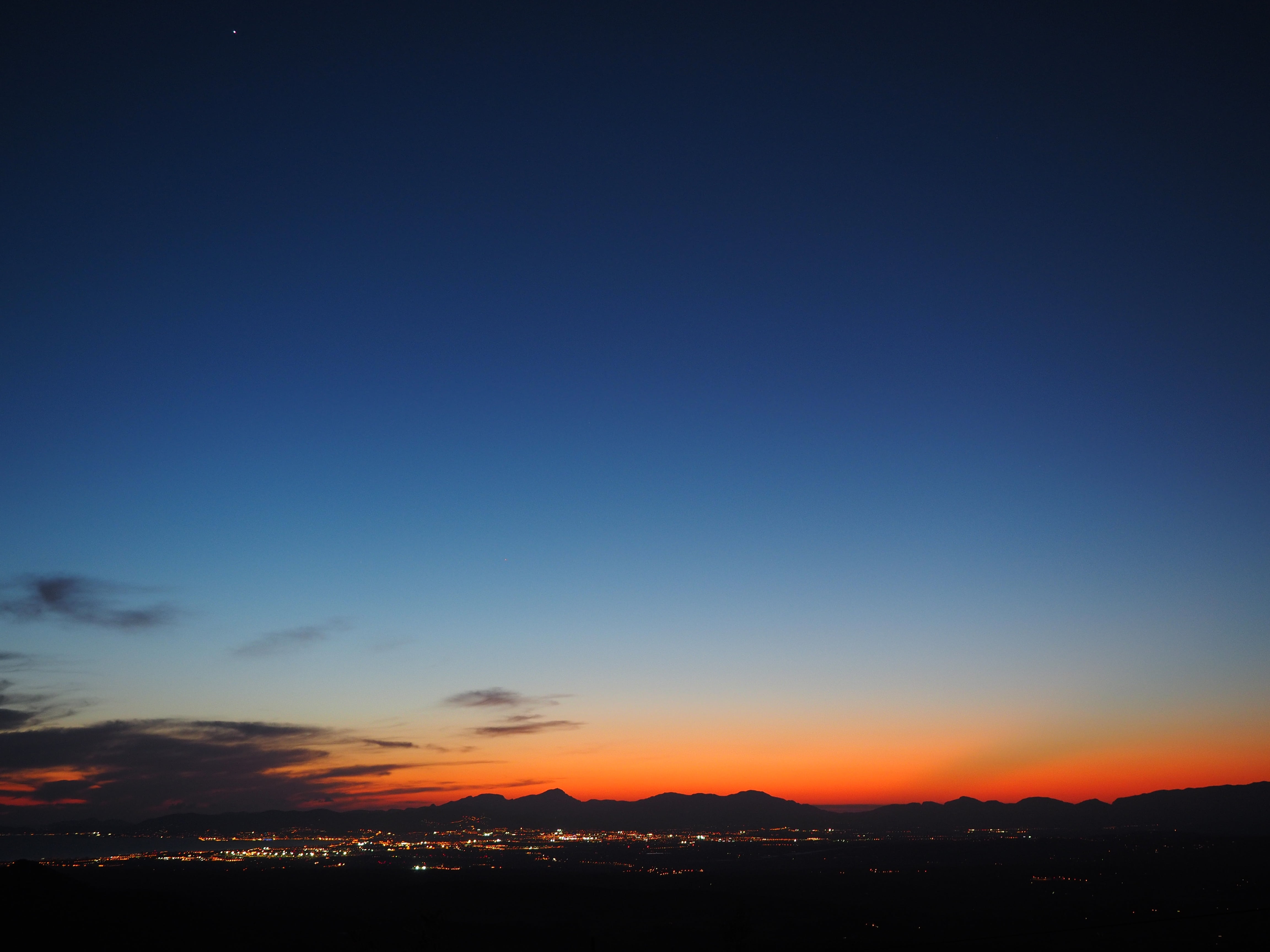 tranquility, cloud - sky, illuminated, 4K, sky, tramuntana, silhouette, outdoors, clouds, outlook, cityscape, evening, evening hour, tranquil scene, city, HD Wallpaper