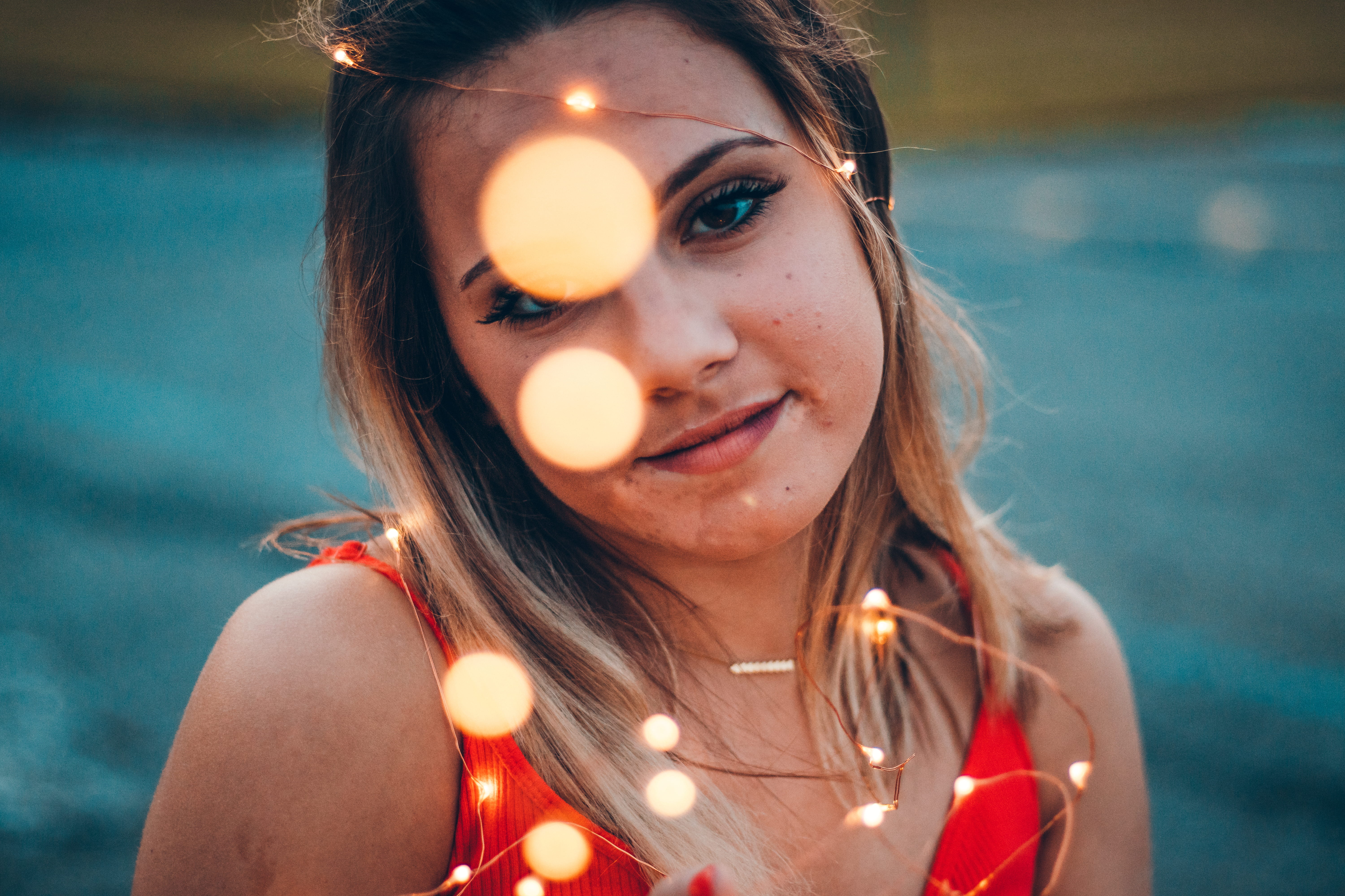 strap, twinkle, shallow, string lights, creme, person, headshot, portrait, flame, girl, dessert, focus, light, bokeh, human, young adult, food, diwali, HD Wallpaper