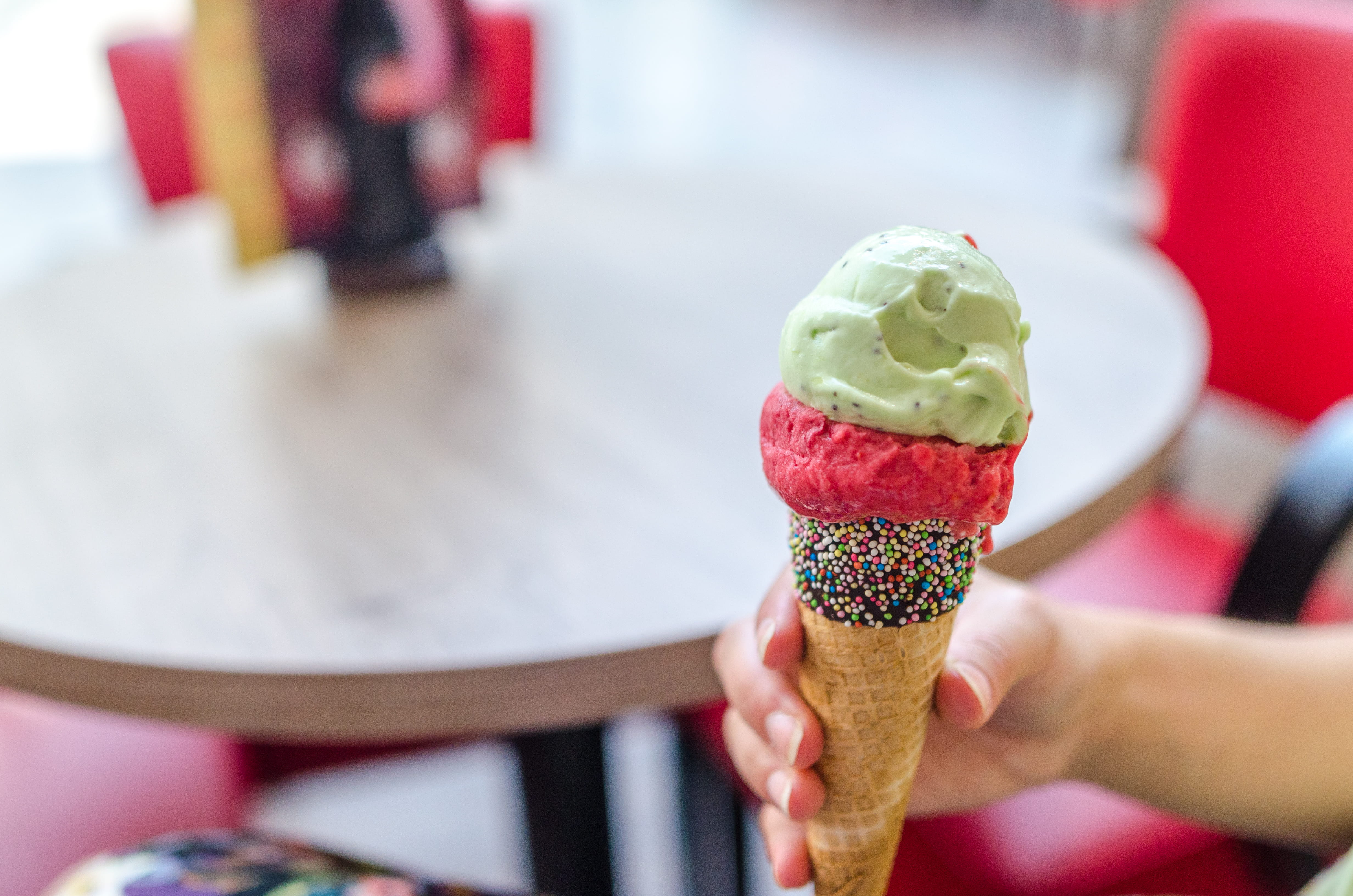 indulgence, sprinkles, restaurant, ice cream, dessert, girl, person, cone, enjoy, fun, close-up, frozen, sweet food, sugar, indoors, cream, human body part, HD Wallpaper