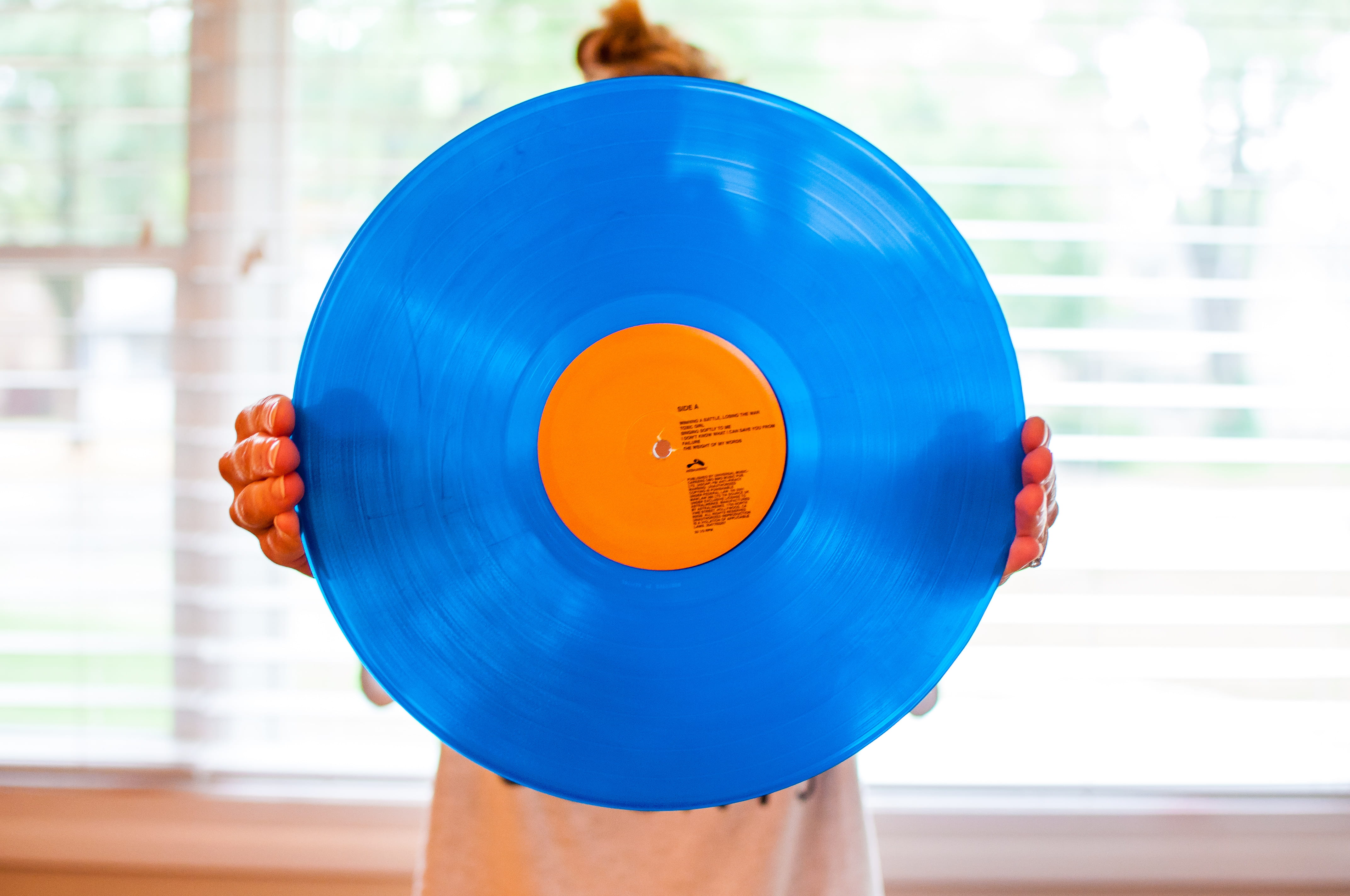 young adult, indoors, focus on foreground, one person, adult, healthy lifestyle, blue, lp, close-up, wax, record, front view, holding, 4K, orange, human body part, HD Wallpaper