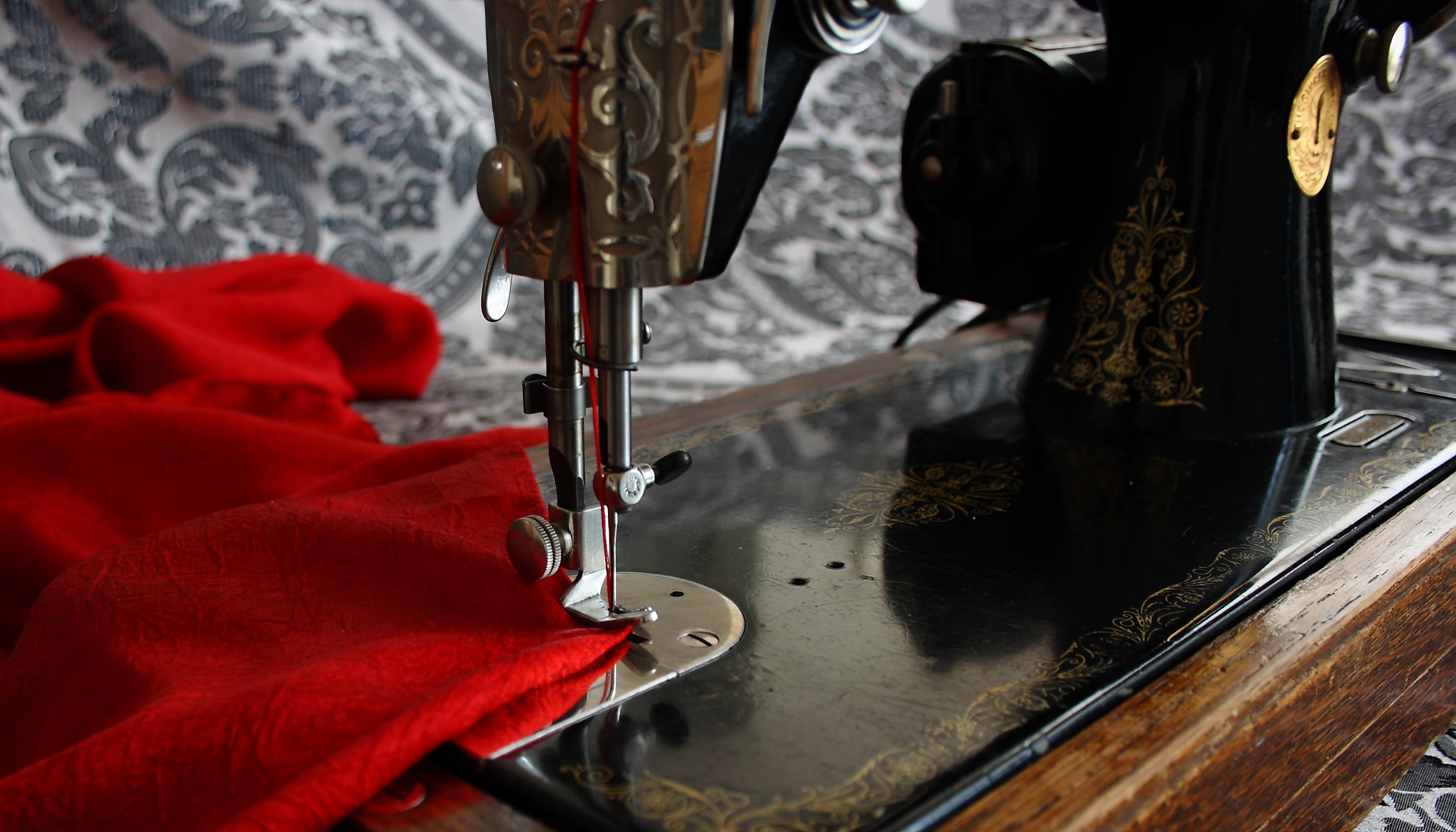 low section, textile industry, small business, selective focus, sewing machine, hanging, clothing, sewing, red, treadle, focus on foreground, day, indoors, HD Wallpaper