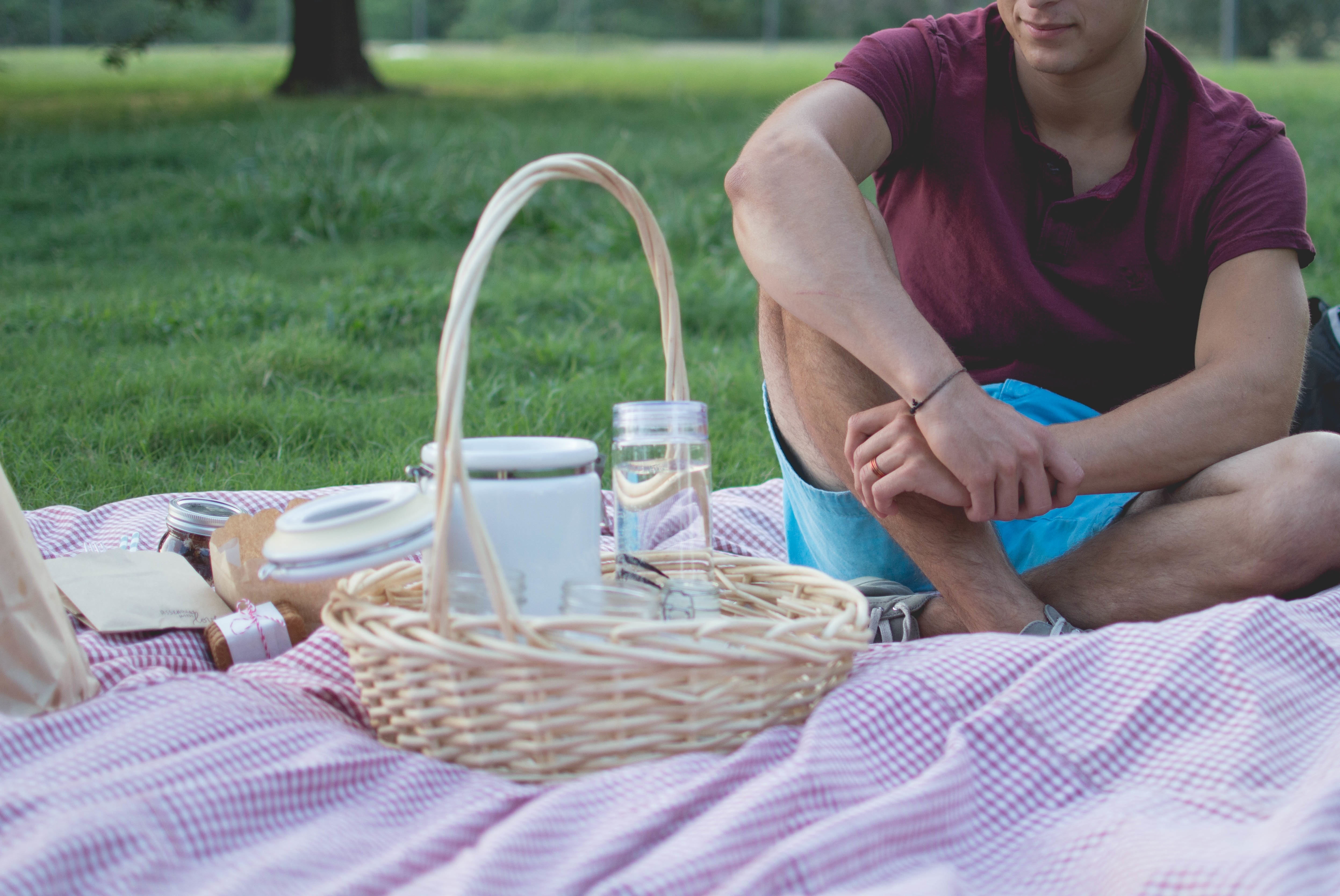 day, grass, man, land, blanket, one person, sitting, midsection, container, women, near, basket, real people, lifestyles, park, picnic, outdoor, wicker, HD Wallpaper