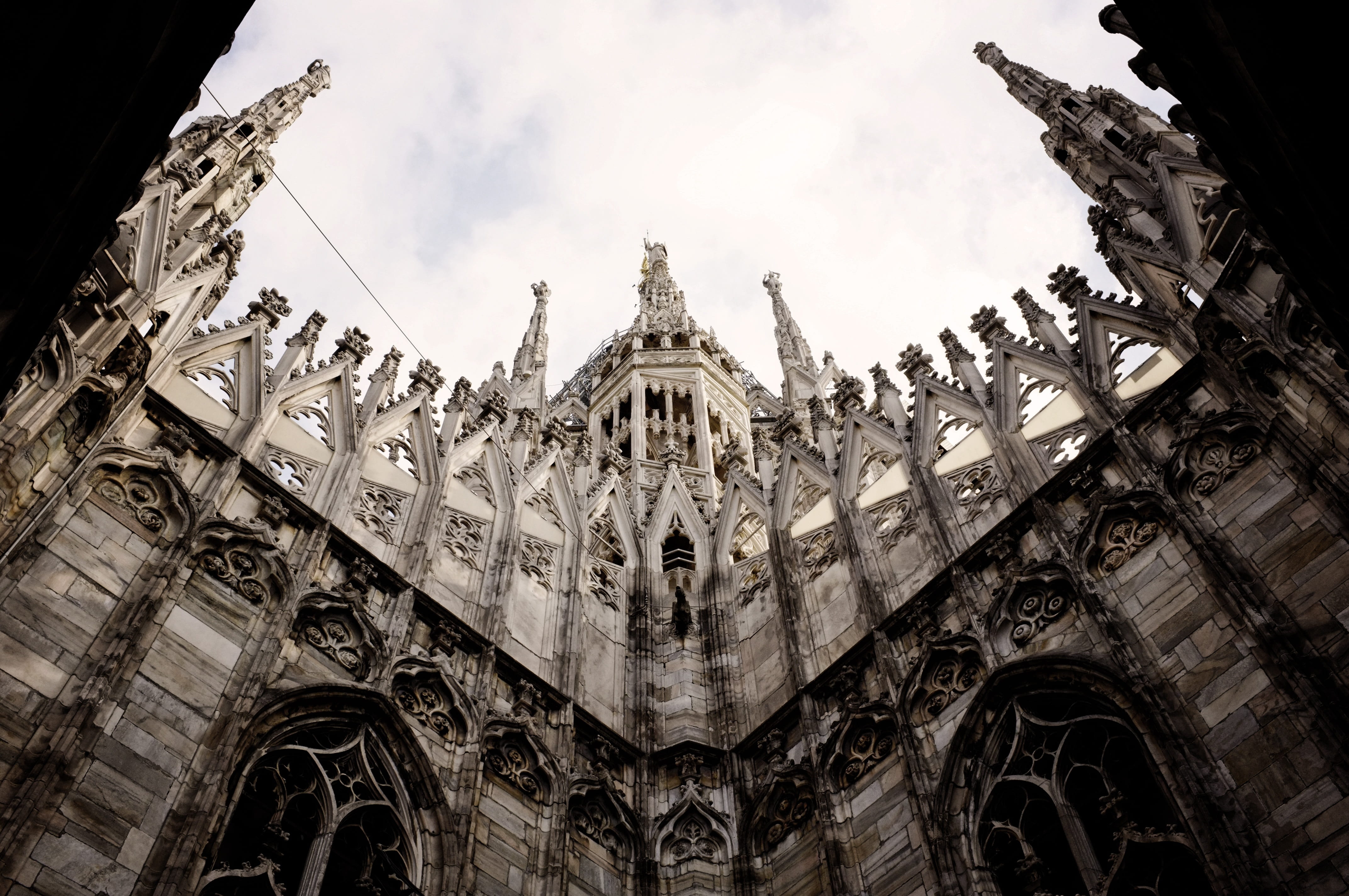 built structure, place of worship, duomo di milano, low angle view, architecture, outdoors, italy, day, cathedral, sky, gray, arch, church, 4K, architectural column, HD Wallpaper