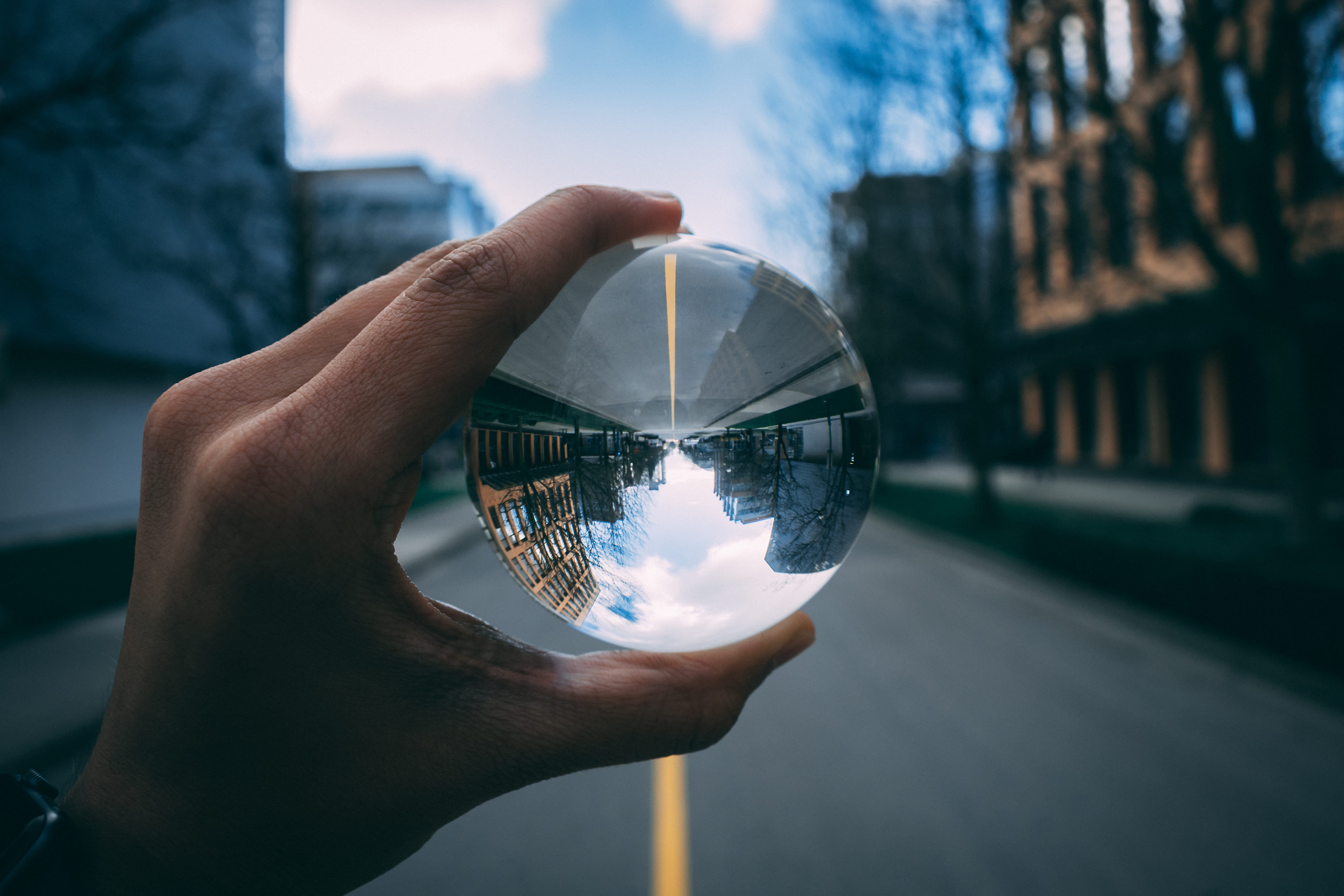 infinity, lensball, outdoors, lens, finger, 5K, nature, transparent, canada, glass - material, architecture, ubc, body part, building exterior, human body part, HD Wallpaper