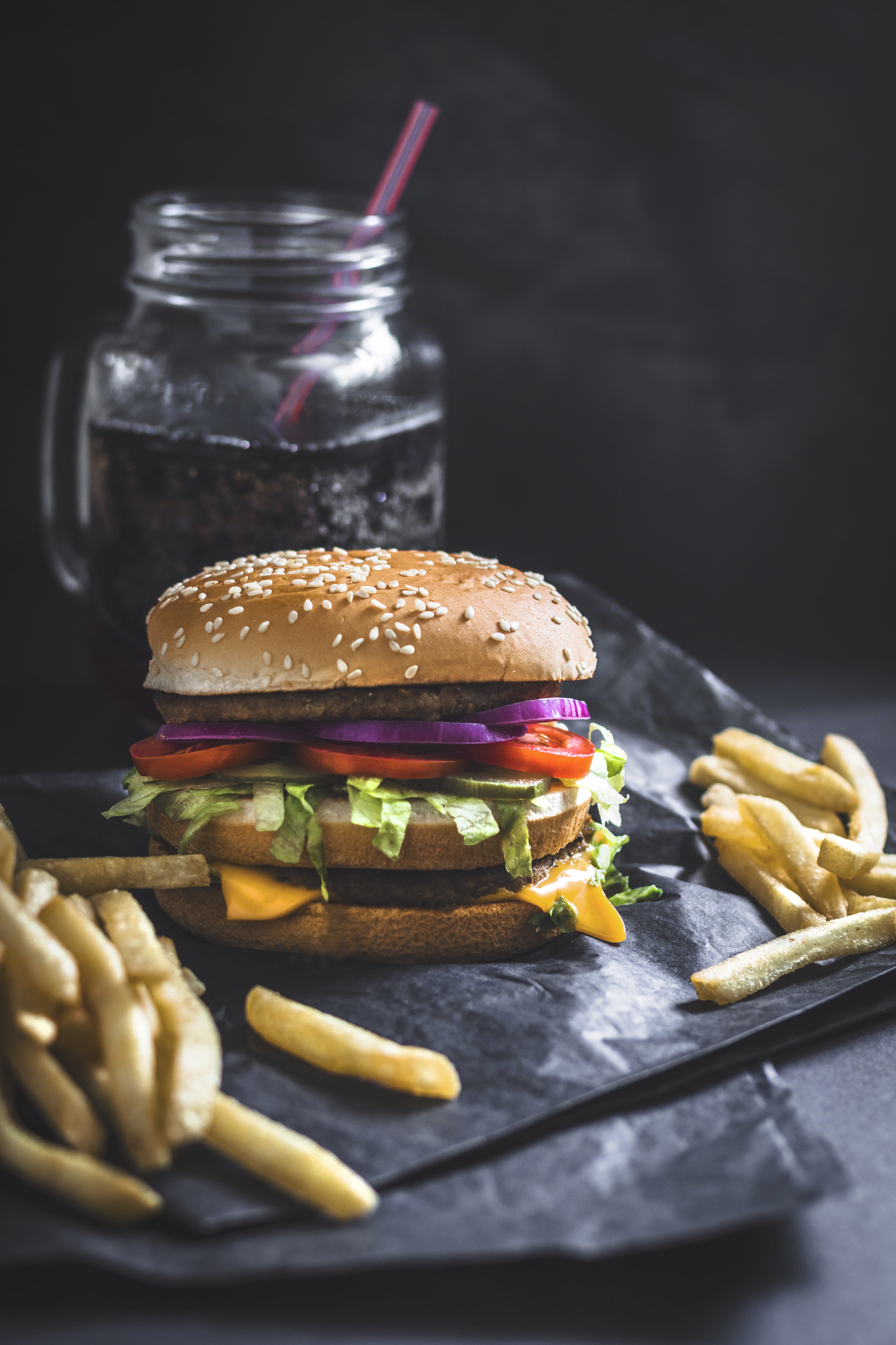 prepared potato, food, food and drink, hamburger, fast food, black background, no people, patty, jar, soda, beef, unhealthy eating, vegetable, meal, bun, Phone HD Wallpaper
