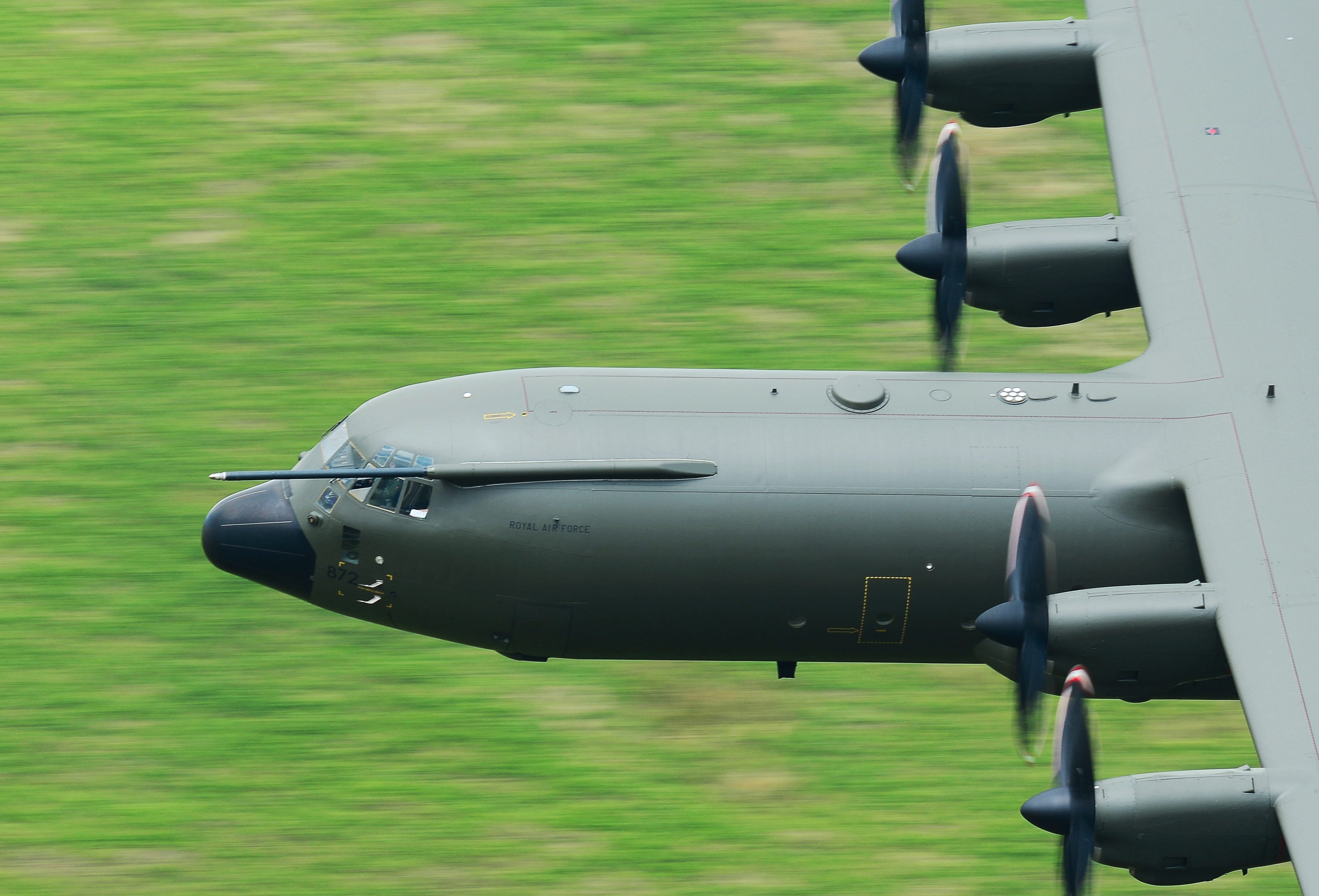aerospace industry, airplane, transportation, military, 2K, motion, flying, mode of transportation, transport, hercules, grass, low level, field, nature, HD Wallpaper