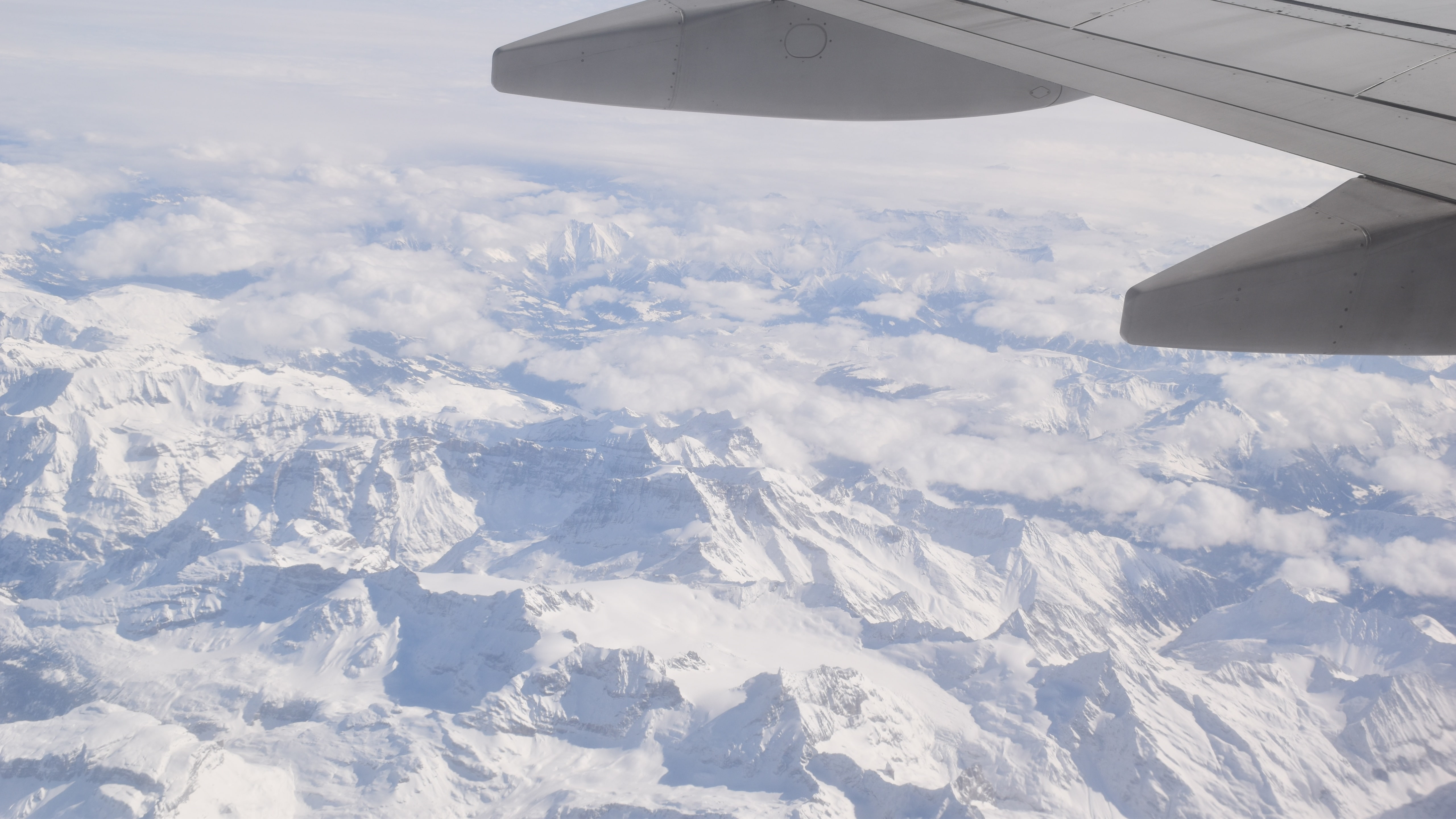 aviation, flight, flying, clouds, travel, transportation, mountains, snow, transport, wing, plane, aerial photography, 5K, winter, birds eye view, HD Wallpaper