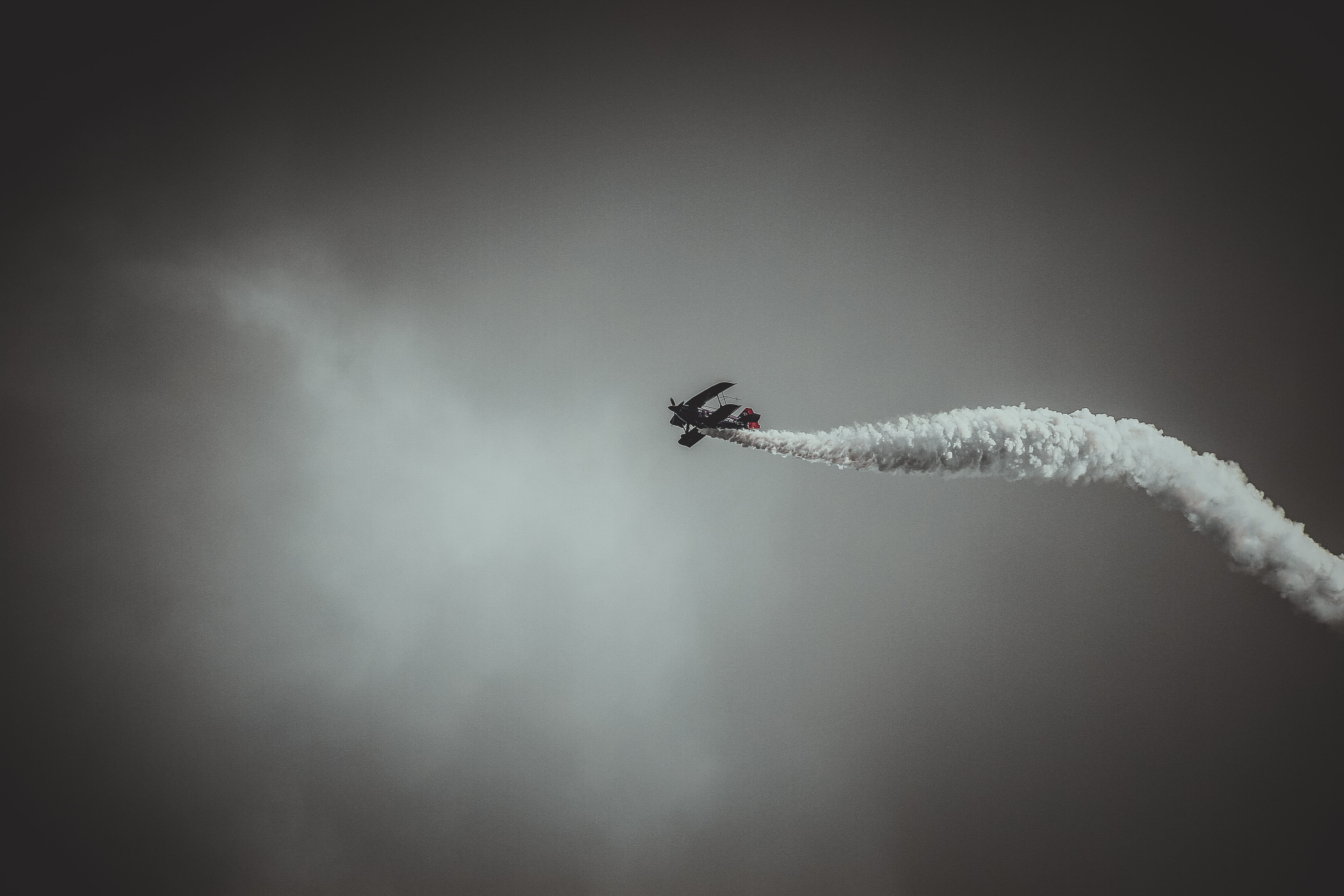 black-and-white, smoke - physical structure, photography, no people, flying, aerobatics, mid-air, cloud - sky, animal, low angle view, plane, smoke, fighter plane, HD Wallpaper