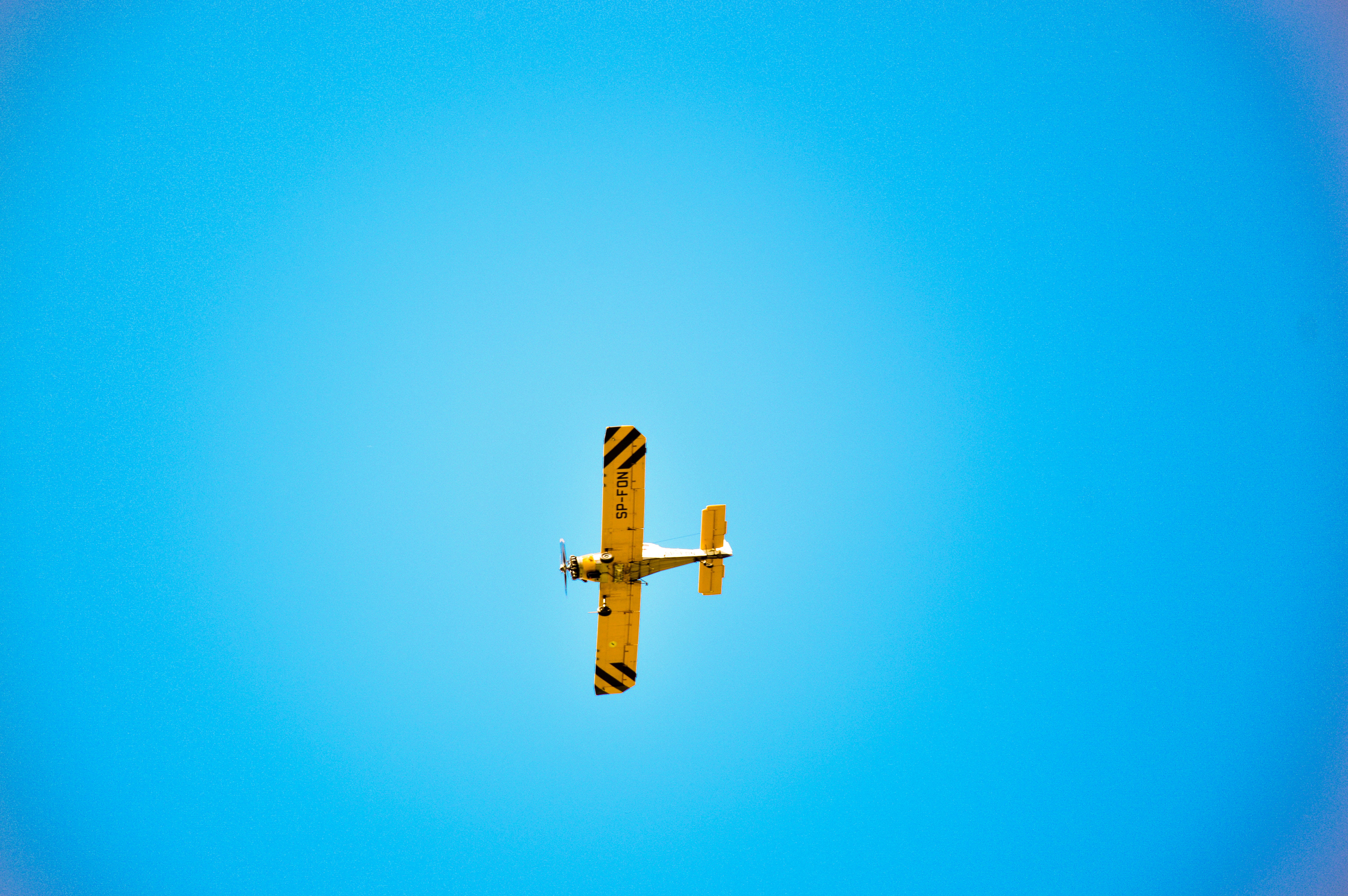 yellow, mode of transportation, no people, blue, white, leaving, on the move, transportation, sign, motion, nature, airshow, aviation, worms, 5K, sunny, HD Wallpaper