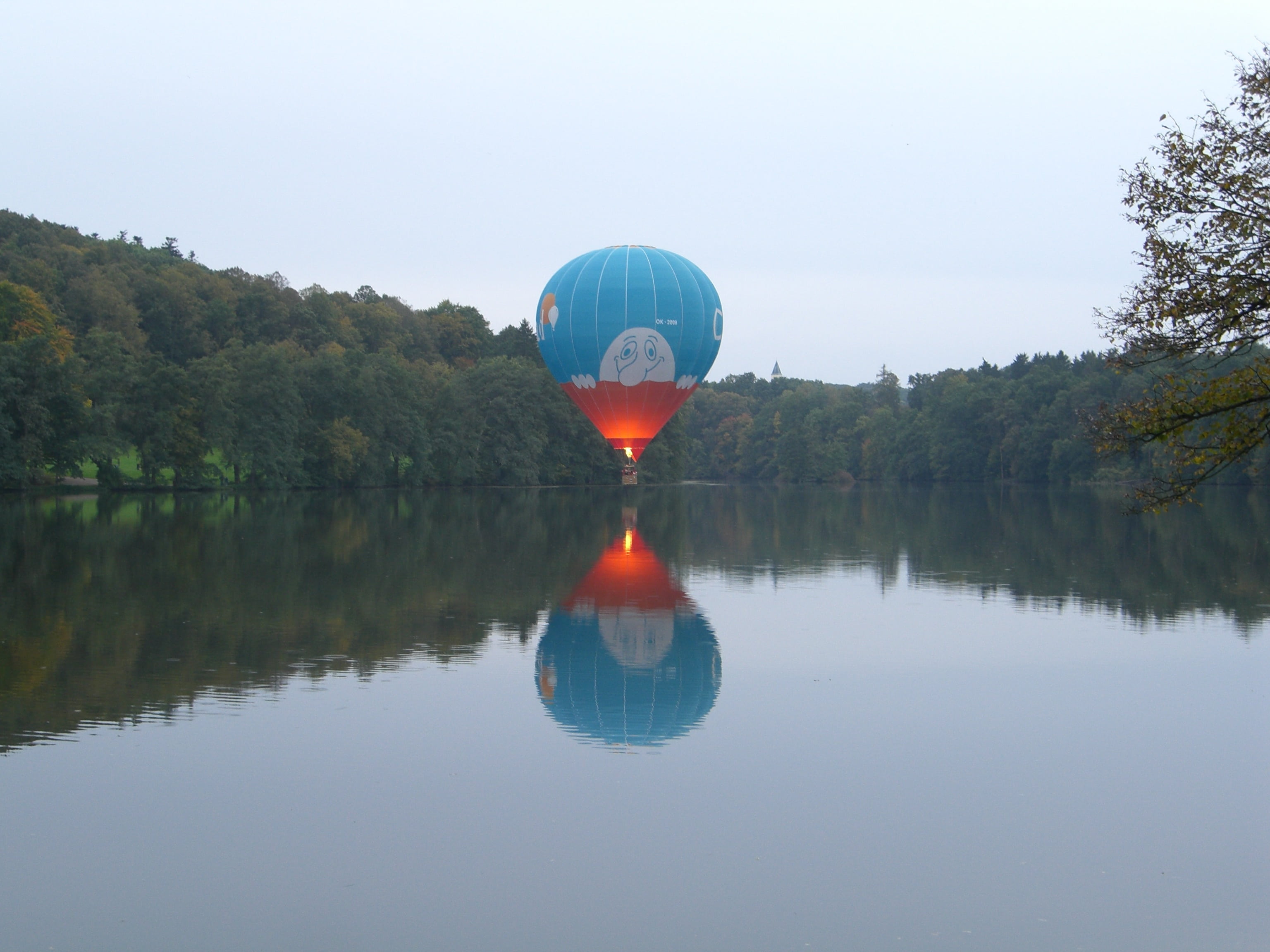 orange color, waterfront, sky, scenics - nature, plant, reflection, hot air balloon, fire, tranquil scene, hover drive, water, nature, outdoors, day, rest, HD Wallpaper