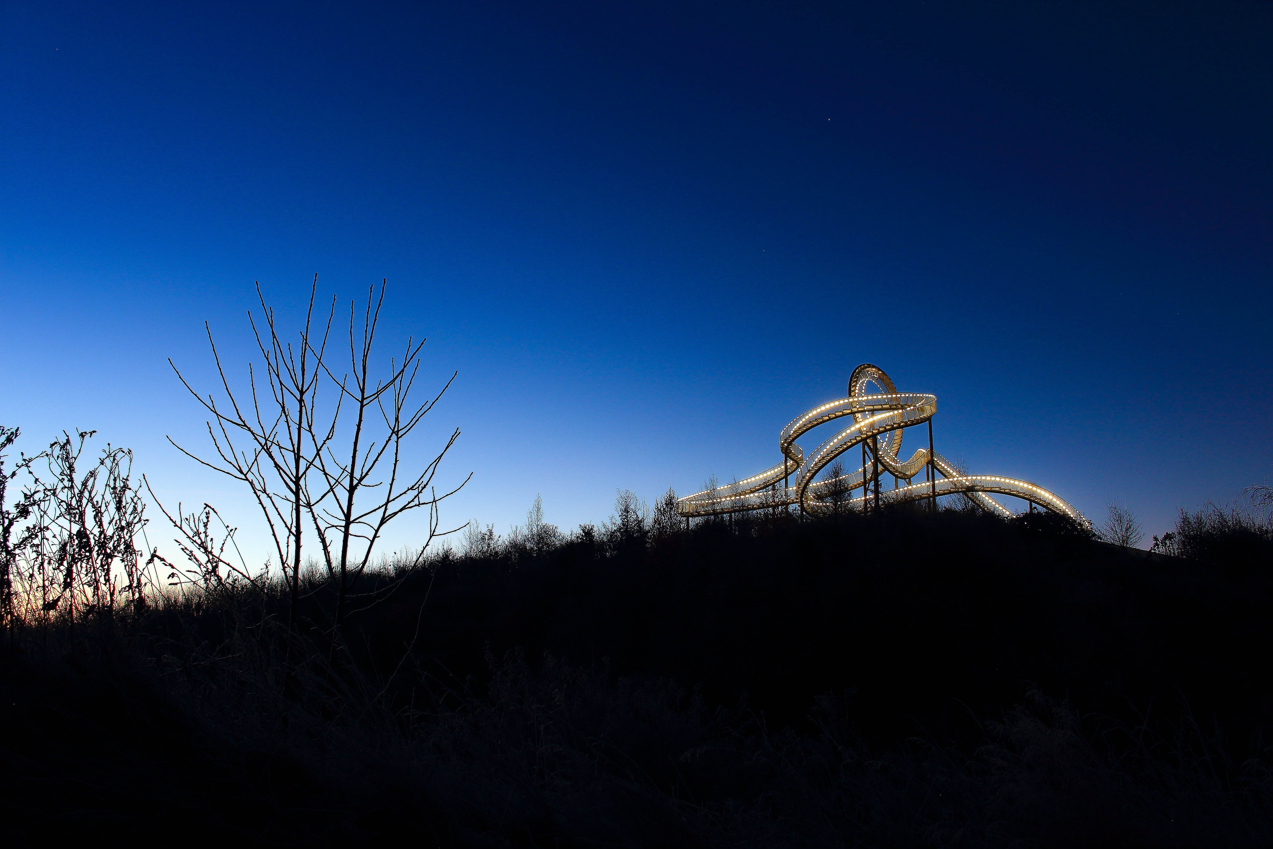 arts culture and entertainment, low angle view, looping, animal, duisburg, emotion, built structure, industry, silhouette, stairs, sky, rollercoaster, ruhr area, HD Wallpaper